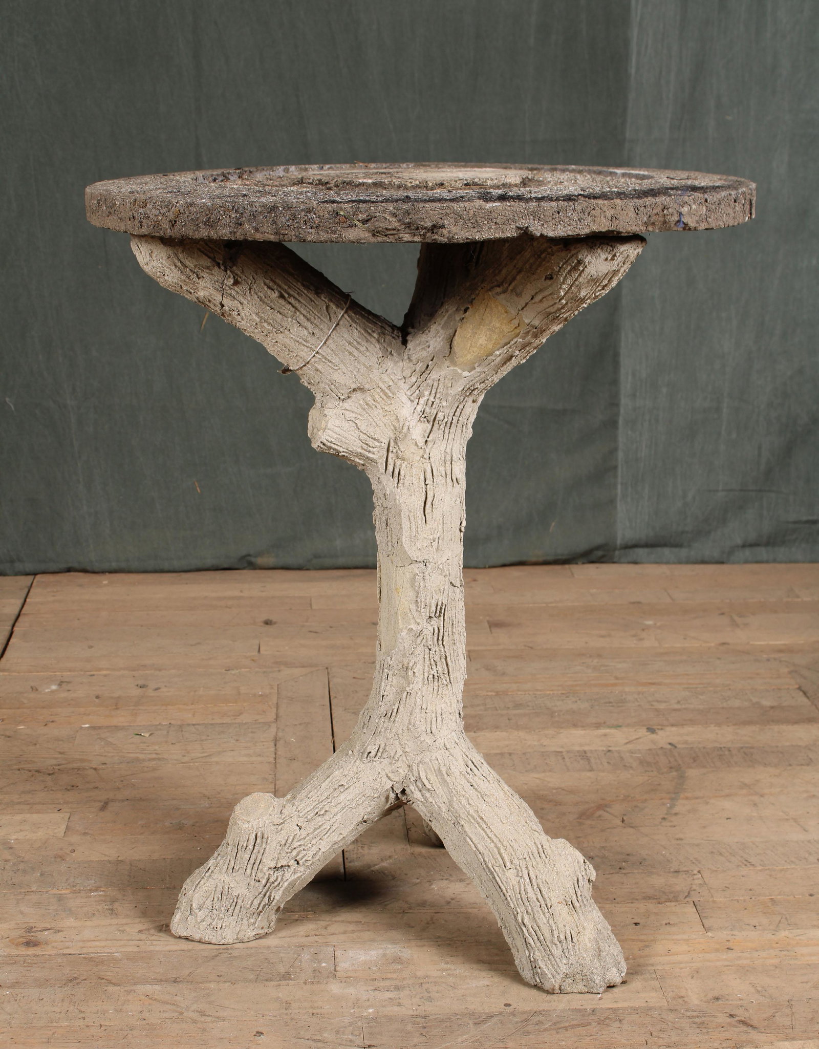 Faux Bois Garden Table: A French Faux bois cast stone garden table. Sculpted ferro-cement. Size: 30.5" H x 25.5" diameter.