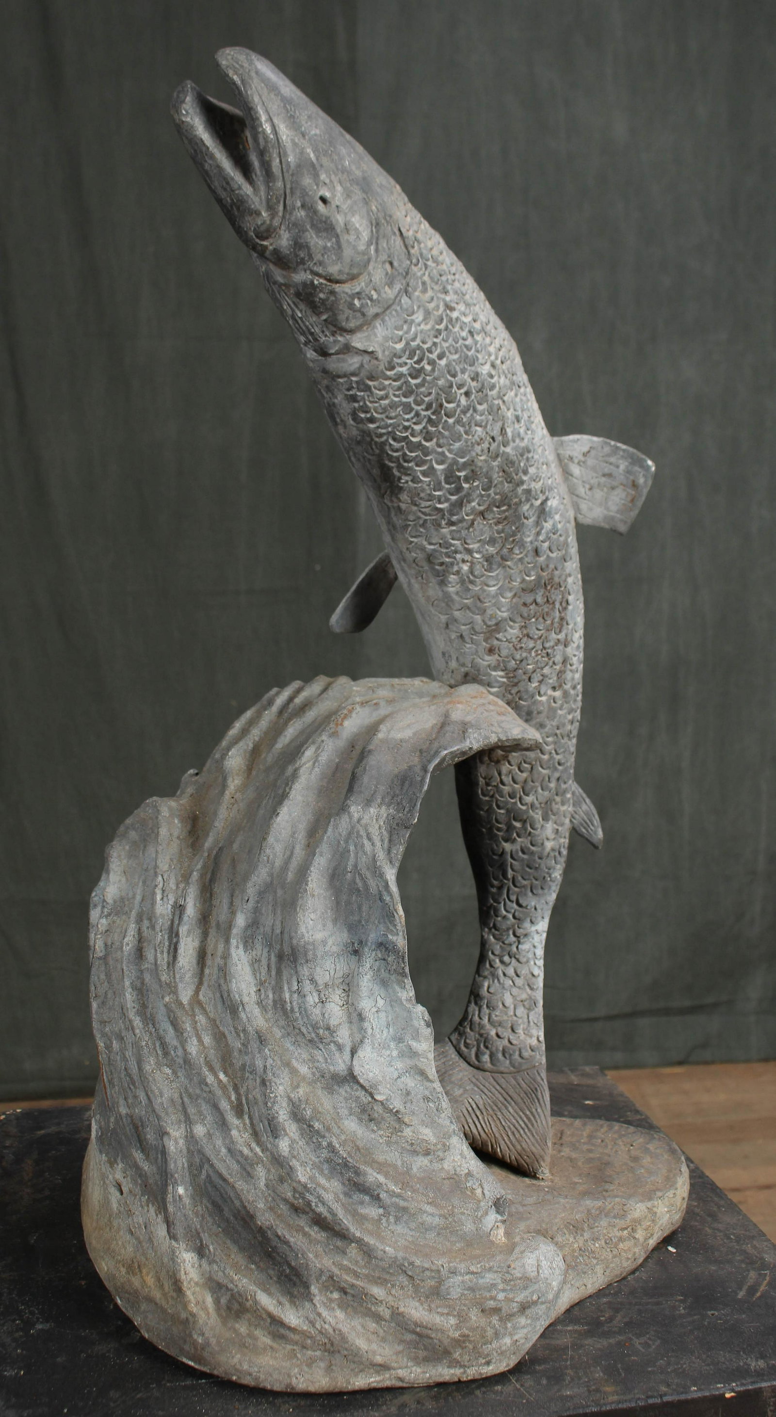Figural Lead Breaching Trout Sculpture: Figural Lead Breaching Trout Sculpture. Signed. Size: 23"H x 12"W x 10"D