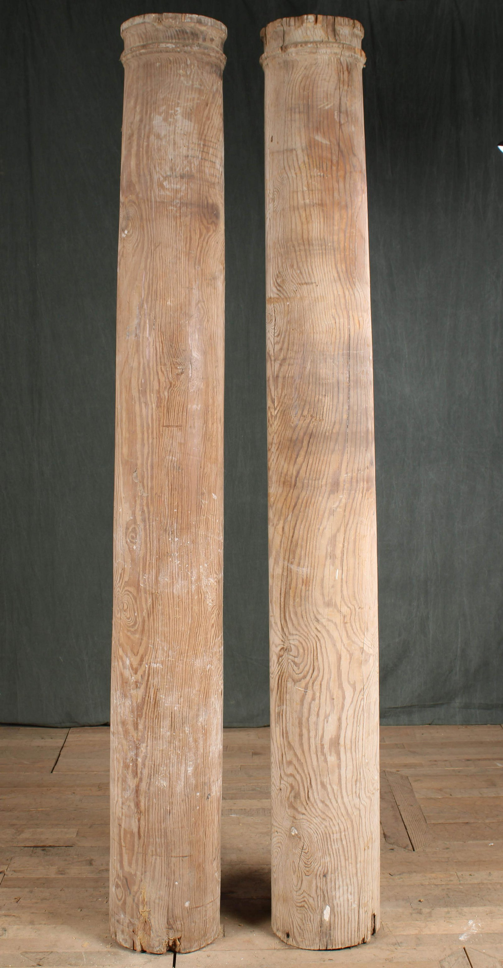 Pair Antique Architectural Carved Wood Columns: A pair of turn of the century carved wood columns. Classical design. Size: 94.5" H Tapered 10.5" - 12" diameter