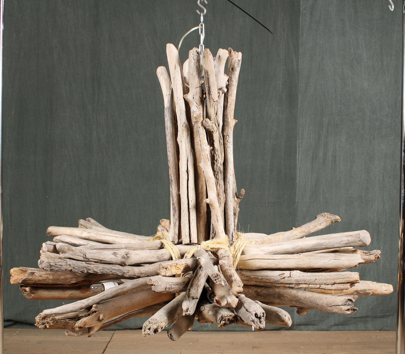 Vacation Home Decor Driftwood Chandelier: An interesting driftwood chandelier having six arms with hidden lights. Great for the beach or mountain house. Size: 31"H x 42"Dia.
