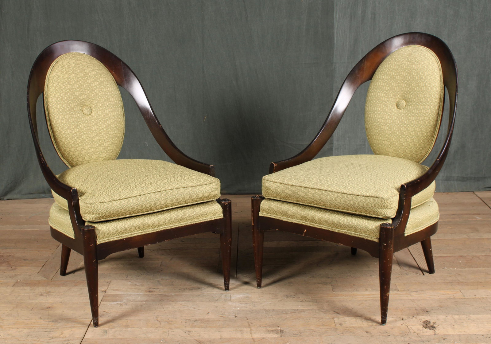 Mid Century Modern Style Armchairs: A very stylish pair of mid century modern style arm chair each having upholstered back over loose cushion seat framed by down swept arms.