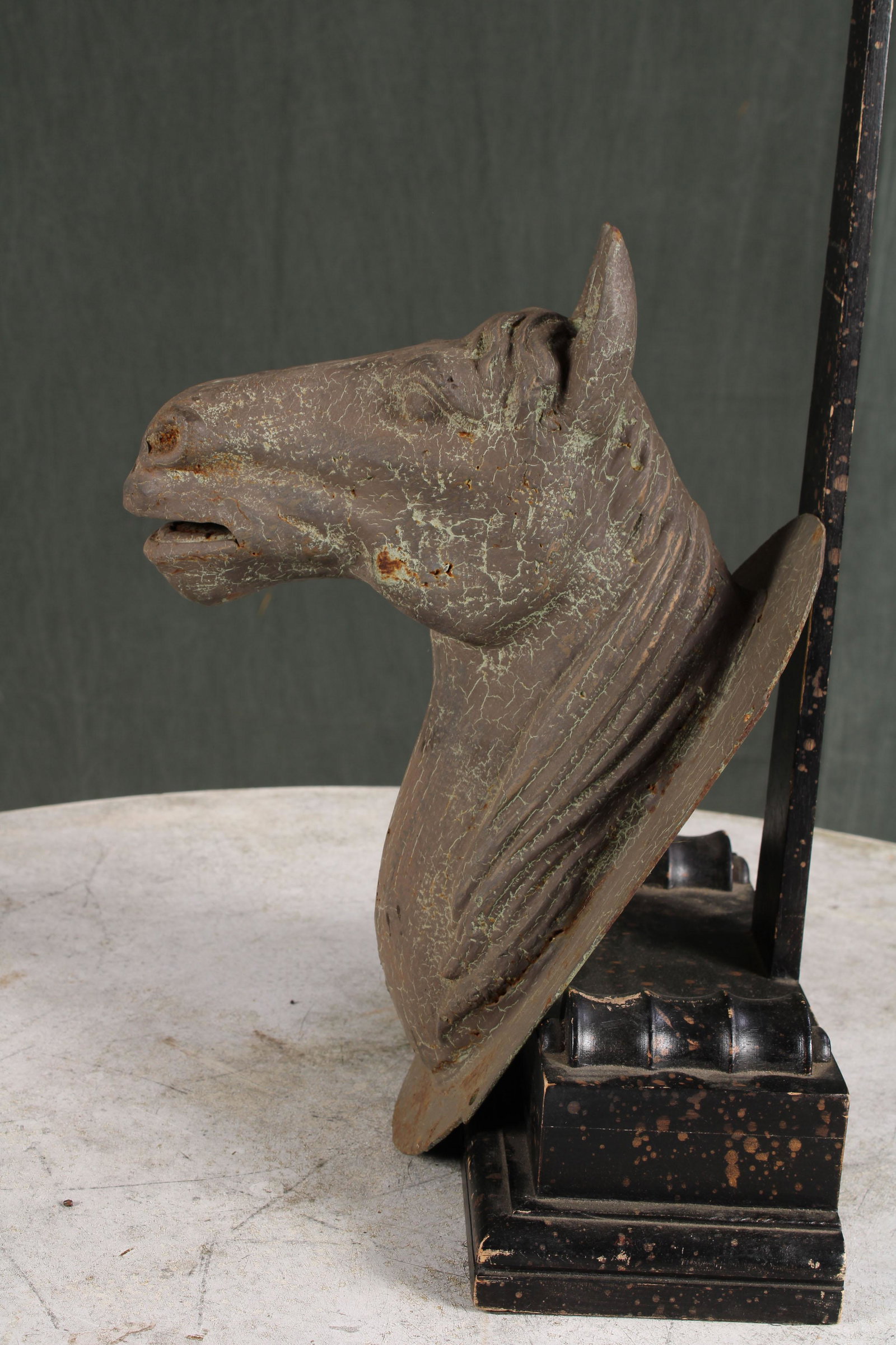 Cast Iron Tack Shop Horse Head Plaque: Cast Iron paint decorated horse head mounted on iron back plate. Size: 14.5" H x 7" W x 10.5" D.