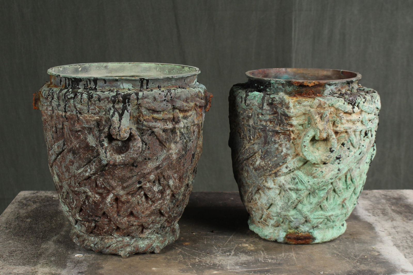 2 Brutalist Style Verdigris Copper Planters: 2 Brutalist Style Verdigris Copper Planters. Similar pair of basket weave motif planters. Salvaged industrial molds. Size: 13" H x 12" diameter