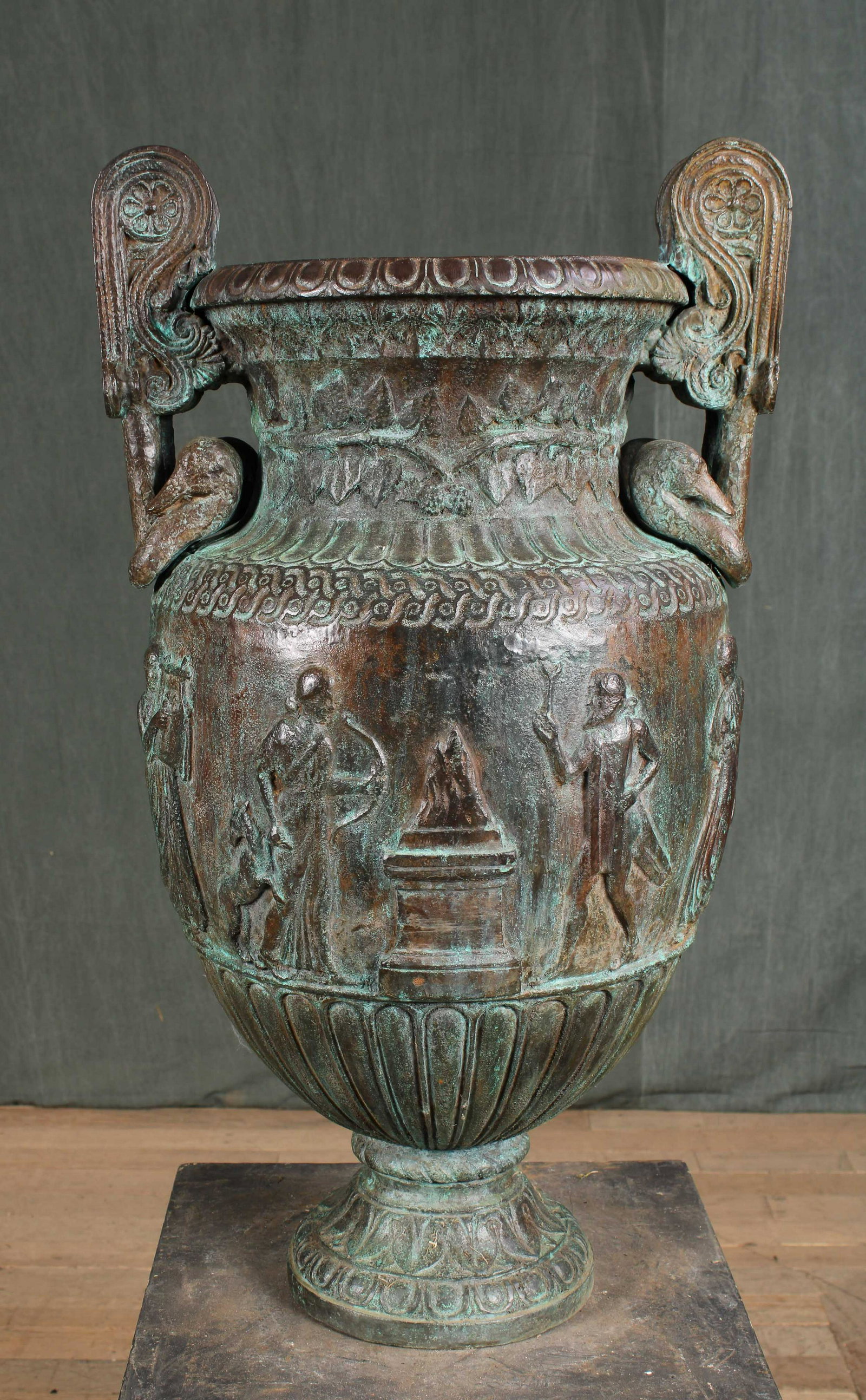 Bronze Neoclassical Style Garden Urn: A good bronze Neoclassical garden urn having swan handles and figural border decoration. Size: 30"H x 17"W x 12"D