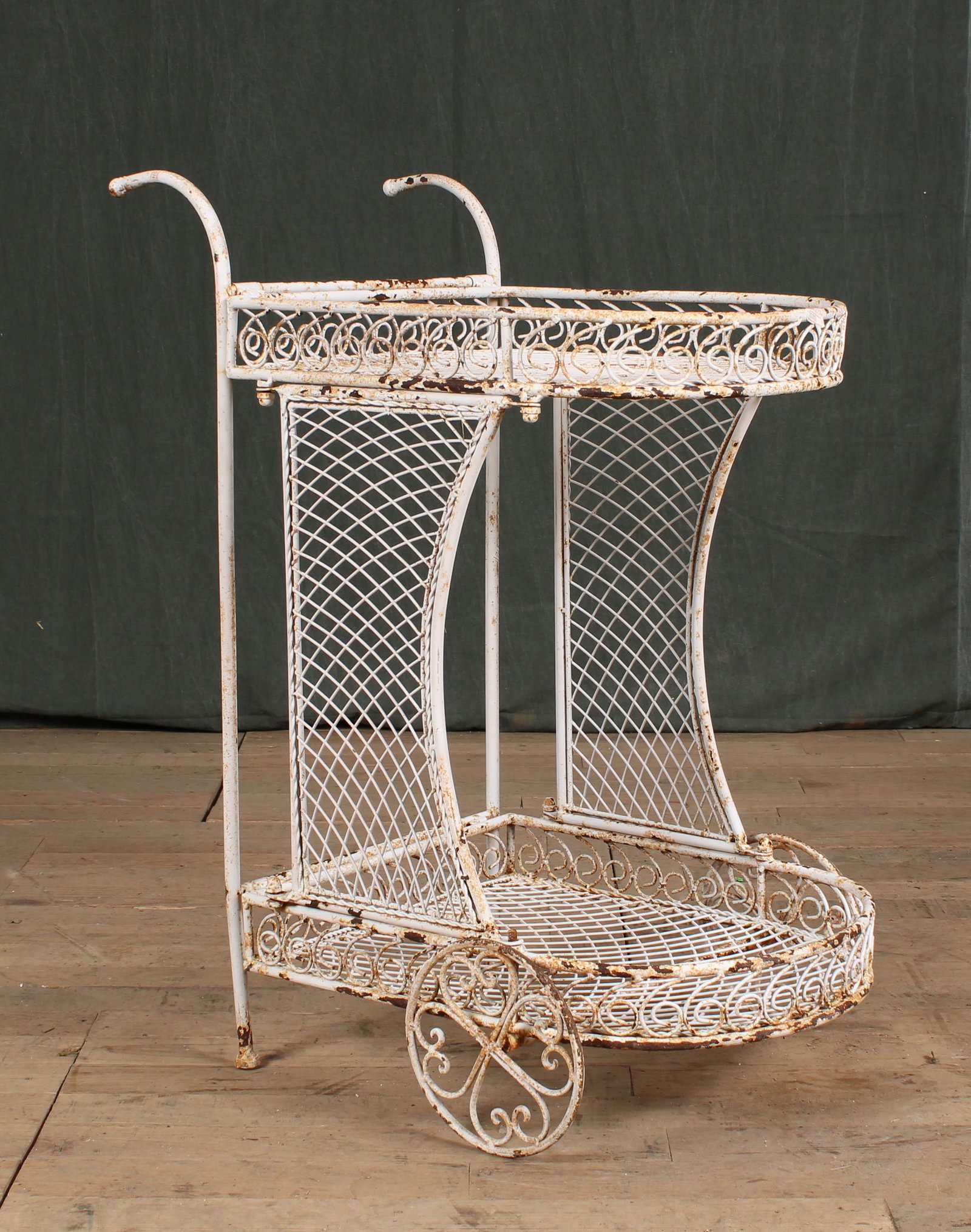 Wrought Iron Drinks Cart: A good wrought iron drinks cart having scroll decorated sides. Size: 31"H x 24"W x 15"D