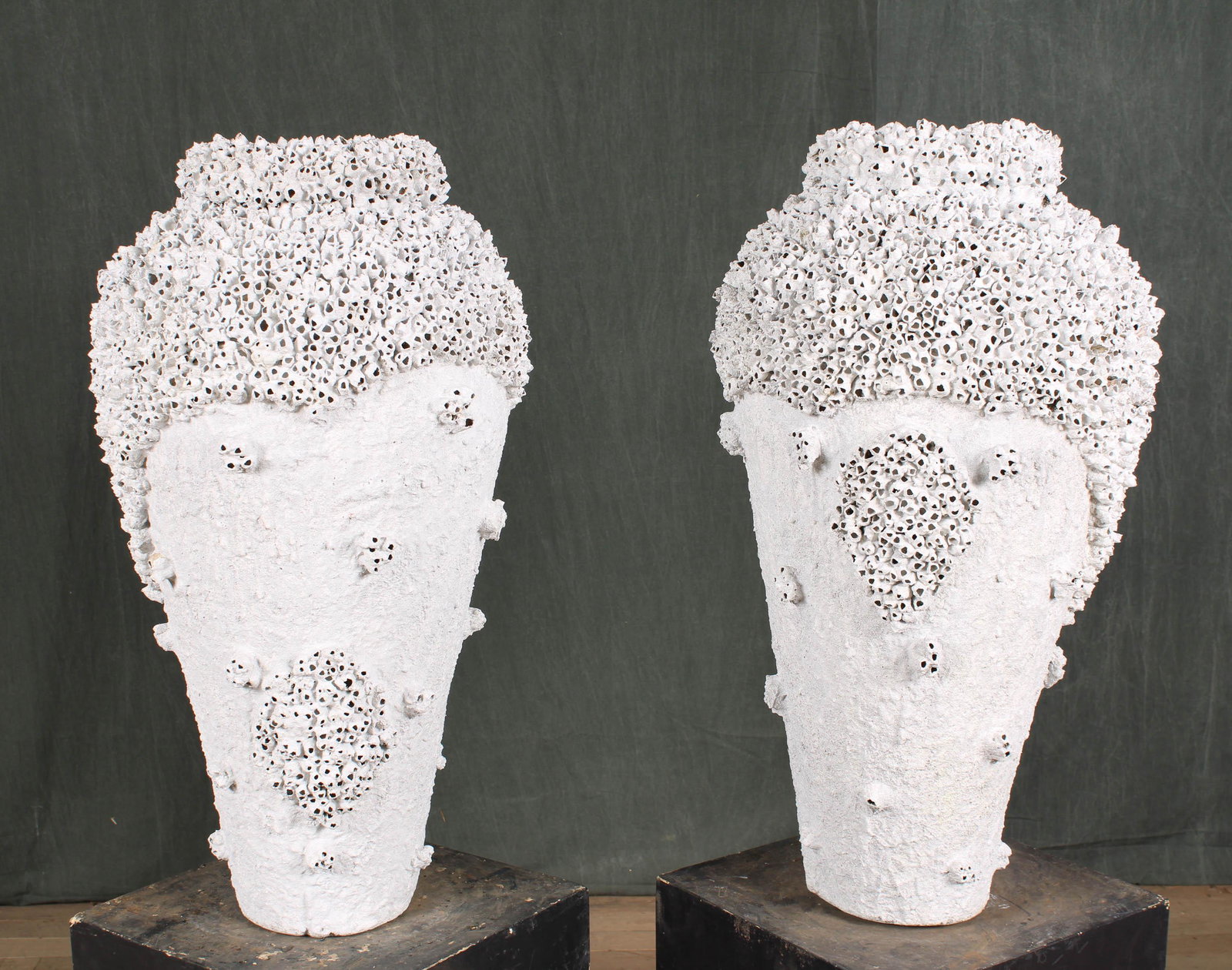 Barnacle Encrusted Urns: A good pair of barnacle encrusted amphora shaped vessels. Size: 33" H x 18" Diameter
