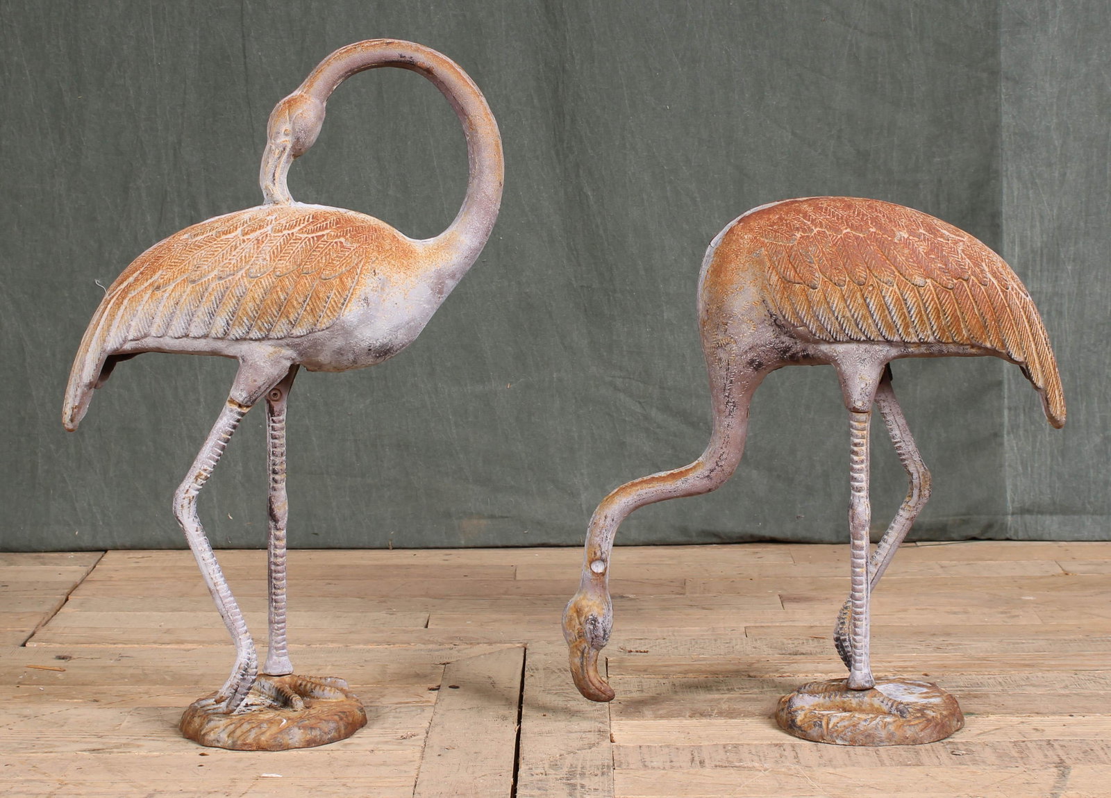Pair Cast Iron Garden Flamingoes: Pair Cast Iron Garden Flamingoes. Size: 23.5"T x 16"L x 16"D; 18"T x 13"L x 16"D