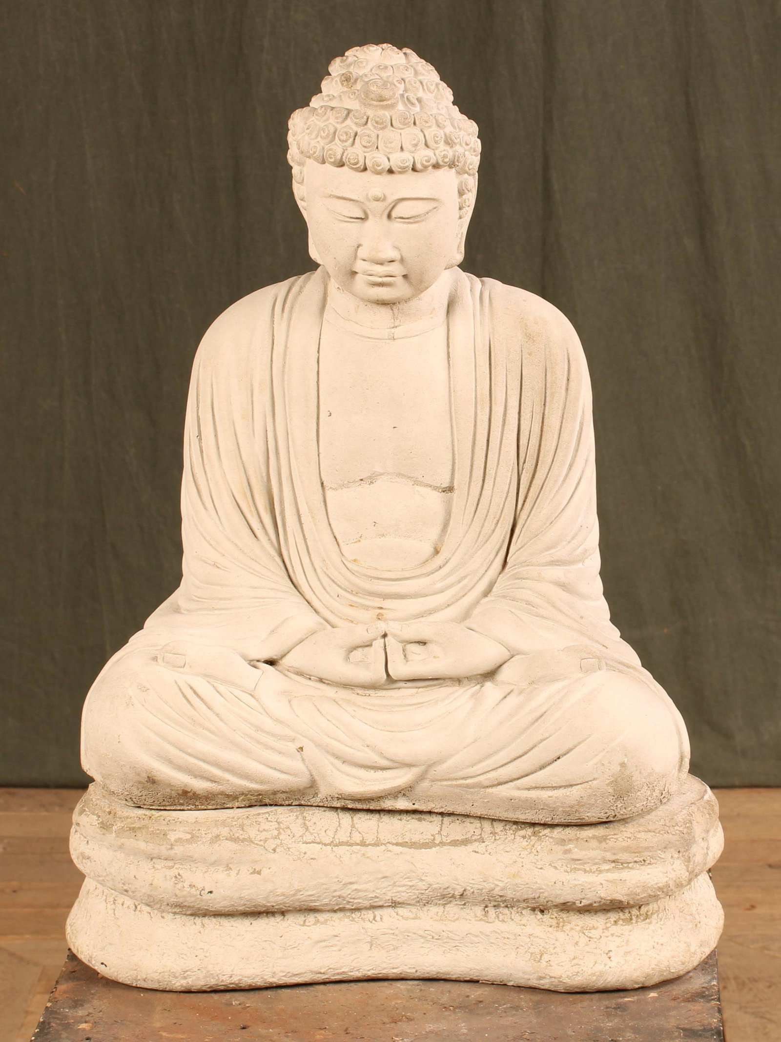 Henri Studio Cast Stone Garden Buddha: A cast stone seated Buddha. Size: 21.5"H x 16"W x 11"D
