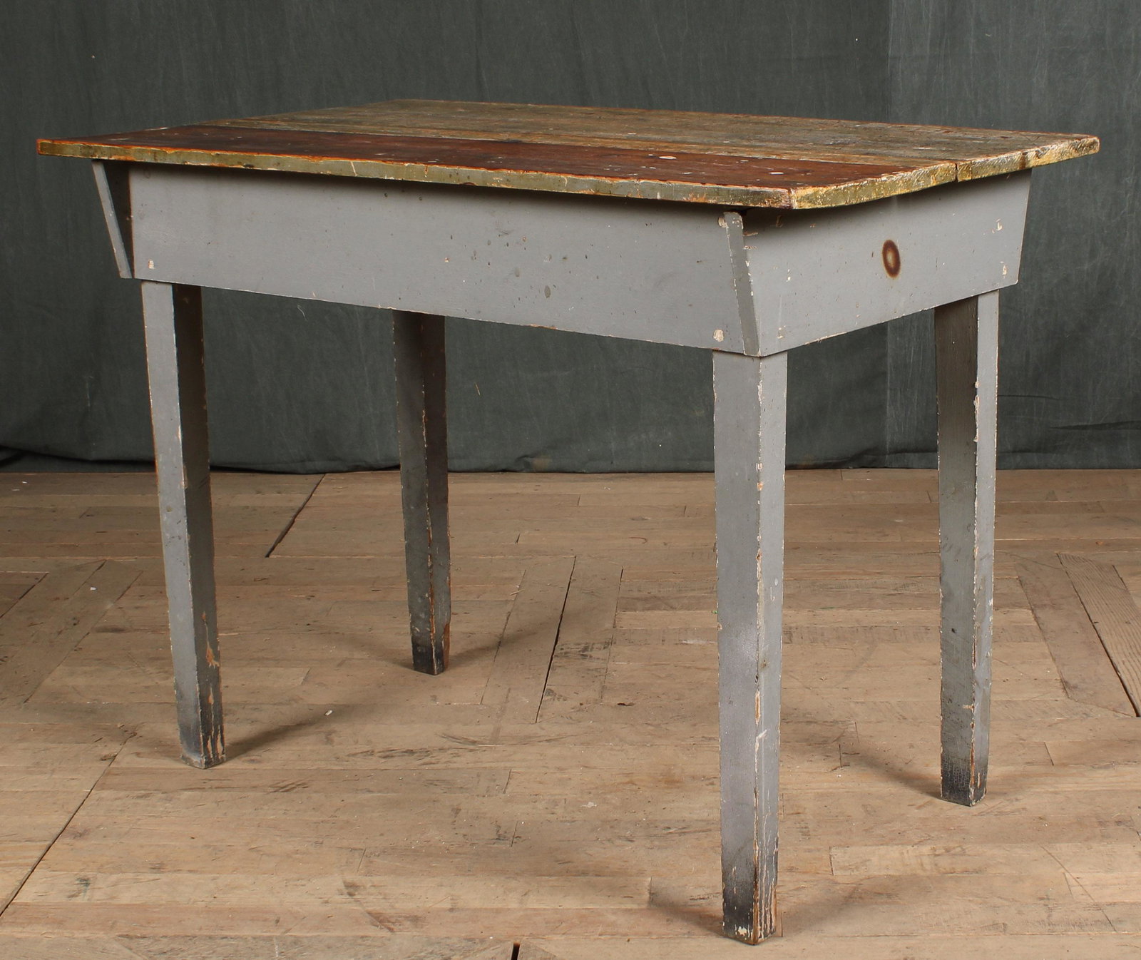 Vintage Farmhouse Work Table: A vintage farm table having scrub top and painted base. Size: 30"H x 40.5"W x 24"D