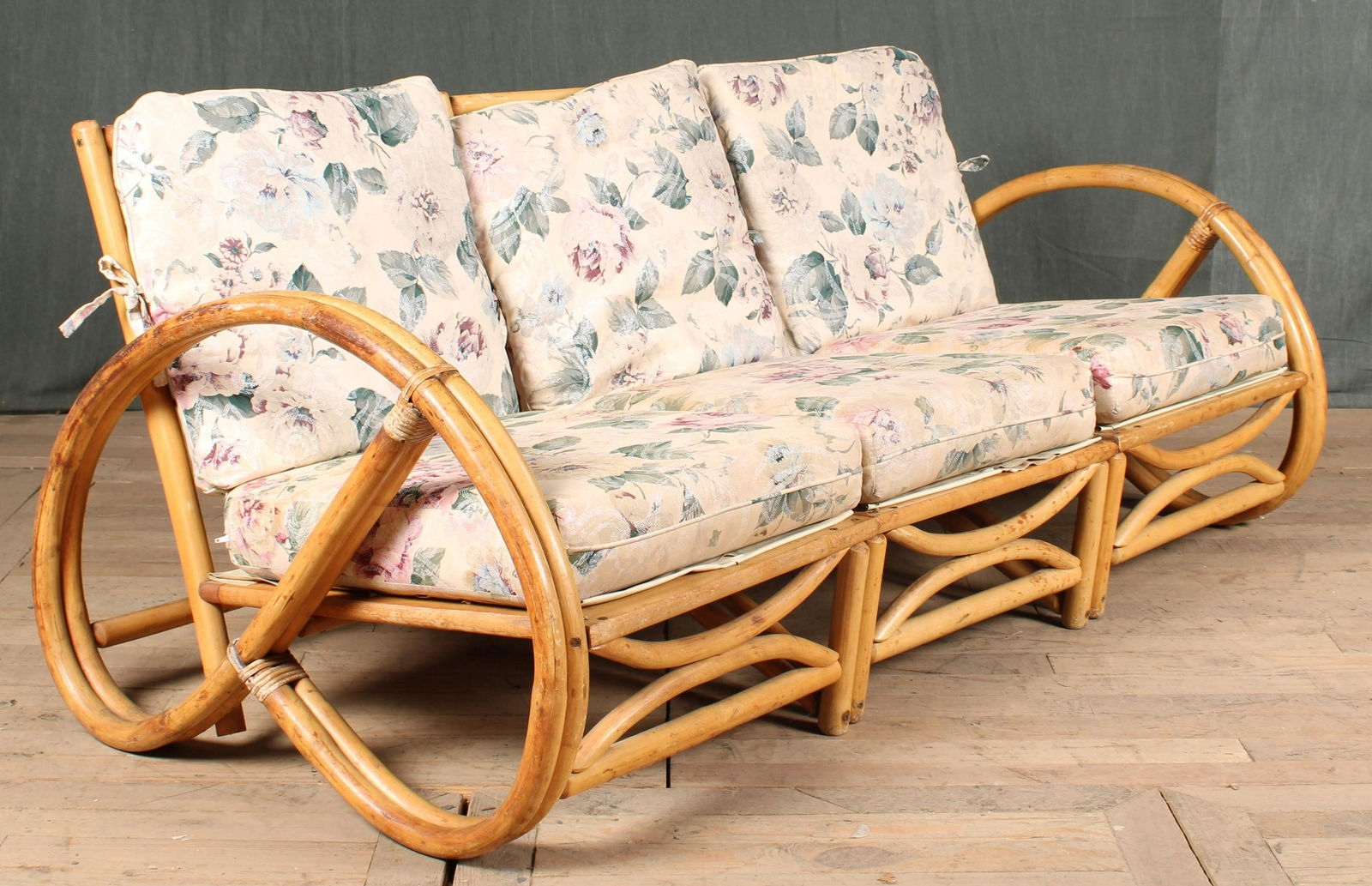 Pretzel Form Rattan Sectional Sofa: A vintage three piece pretzel form rattan sectional sofa. Great style. Size: 28"H x 67"W x 29"D