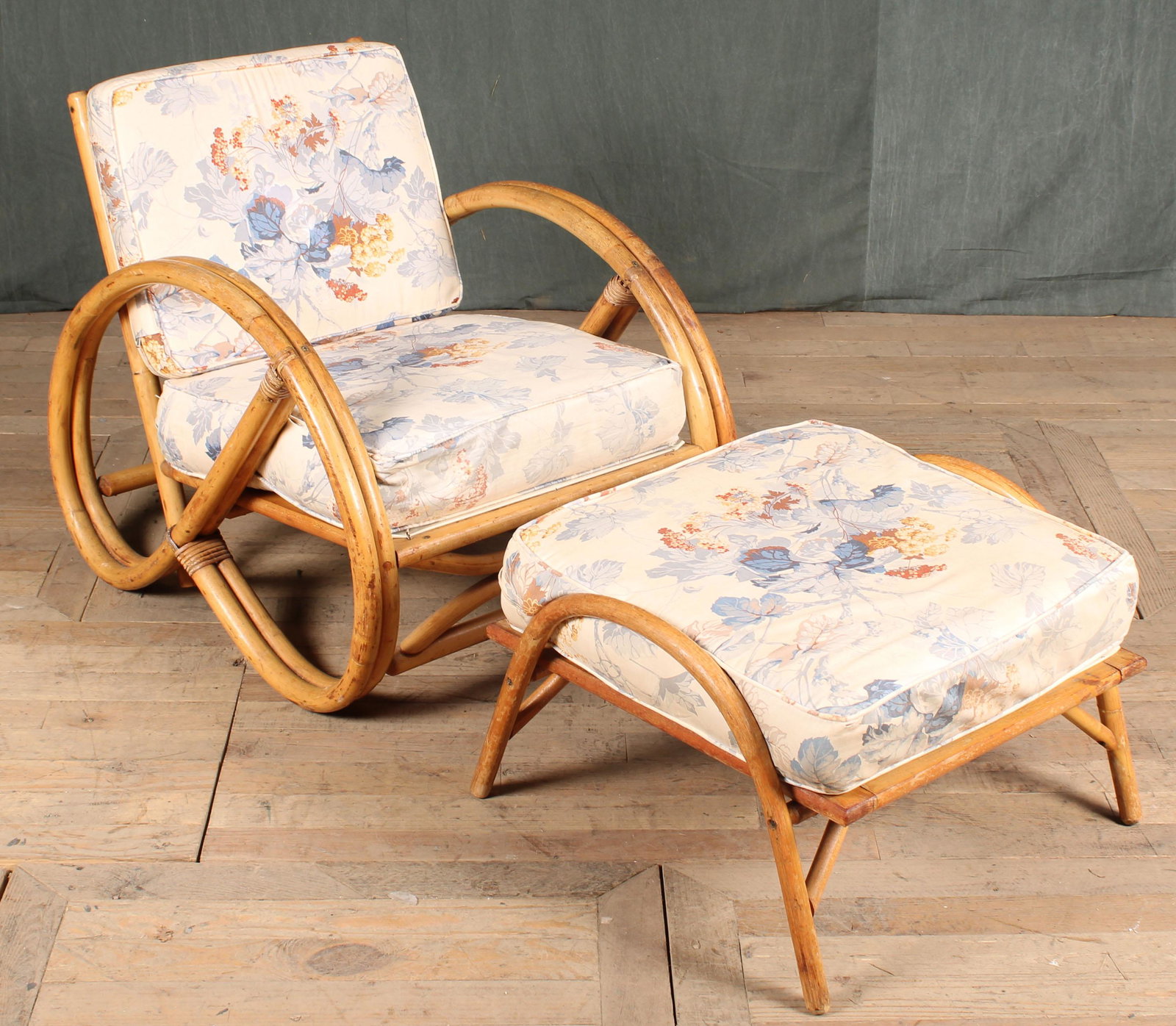 Viontage Pretzel Form Rattan Chair and Ottoman: A good vintage pretzel form rattan lounge chair and ottoman. Size: 28"H x 26"W x 31.5"D