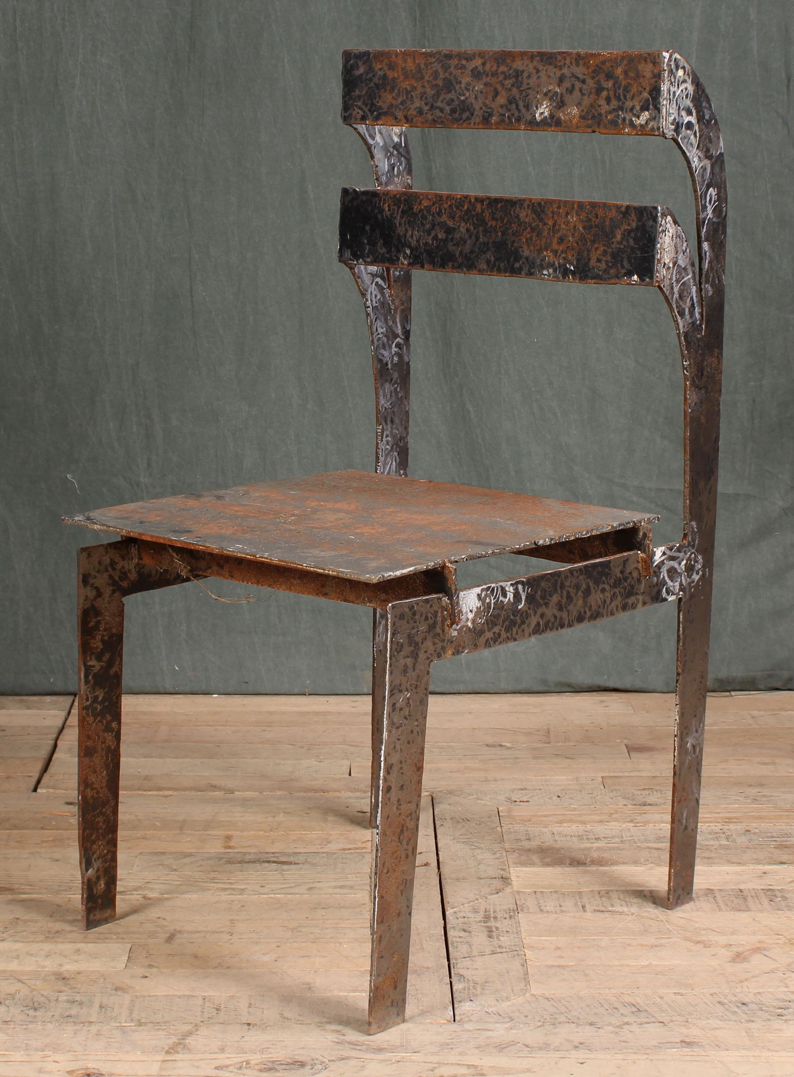 End of Day Iron Chair: An interesting end of day sheet iron chair with strong architectural lines. Size: 36.5"H x 17"W x 21"D