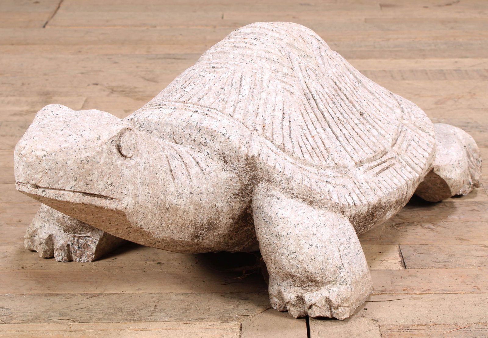 Carved Granite Tortoise: A good carved stone/granite tortoise has great scale and personality. Tuck her in the shrubs to make your friends smile. Size: 10"H x 32"W x 18"D