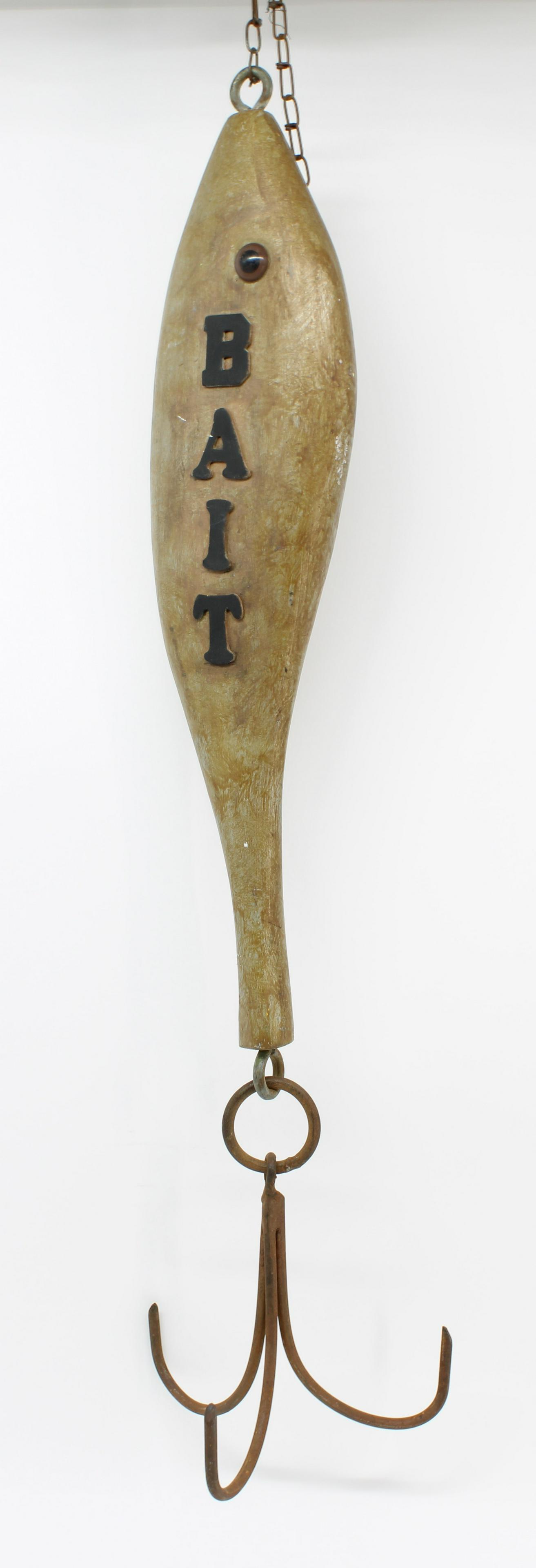 Bait Store Trade Stimulator Advertising Sign: Bait Store Trade Stimulator Advertising Sign. Carved wood and wrought iron. Size: 35"T x 8"W x 7.5"D