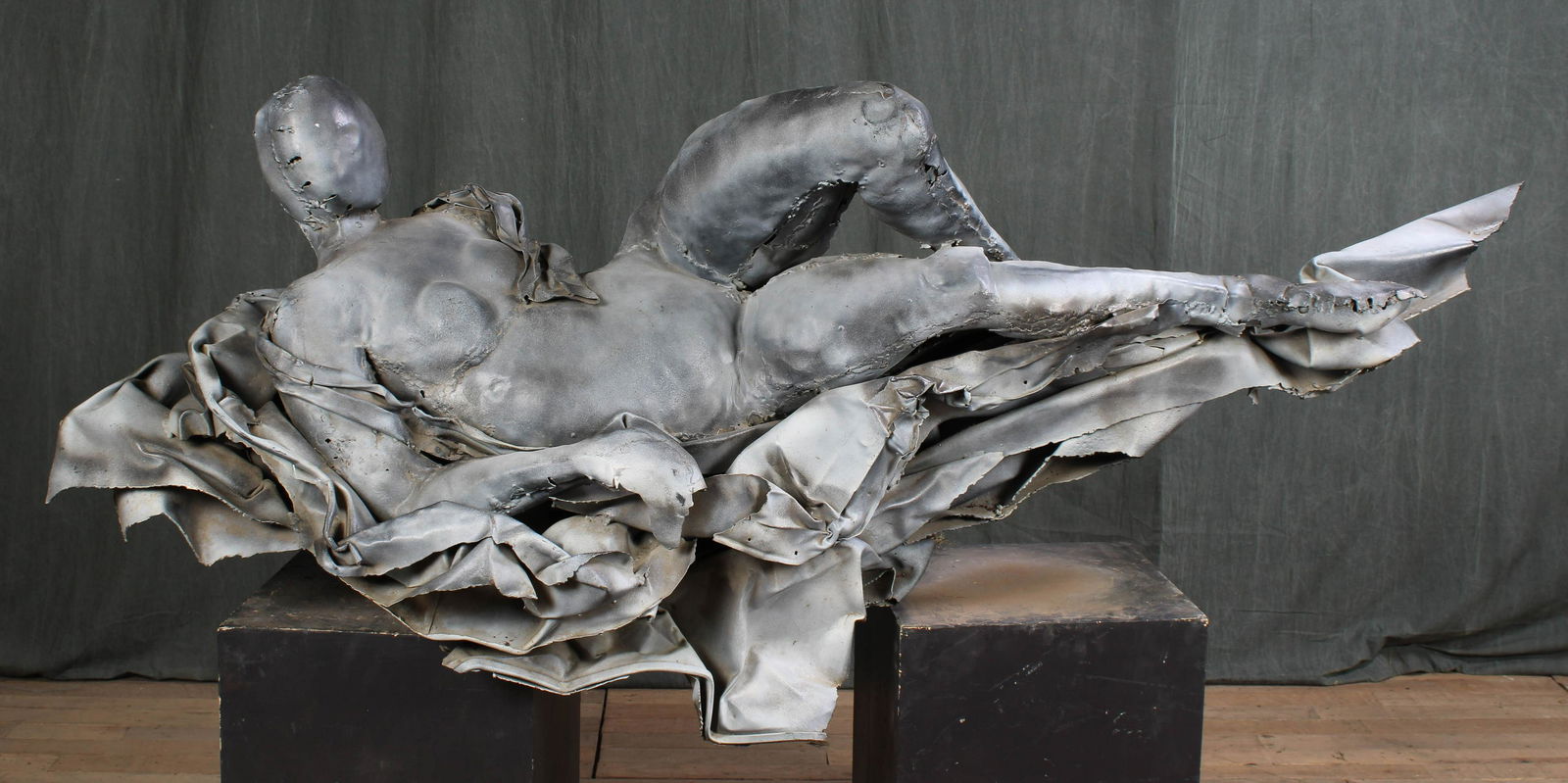 Judith Brown Attr. Sculpture: A life sized Judith Brown attributed brutalist shaped wrought iron figural sculpture of a woman framed by draped elements. Size: 80"H x 25"W x 28"D