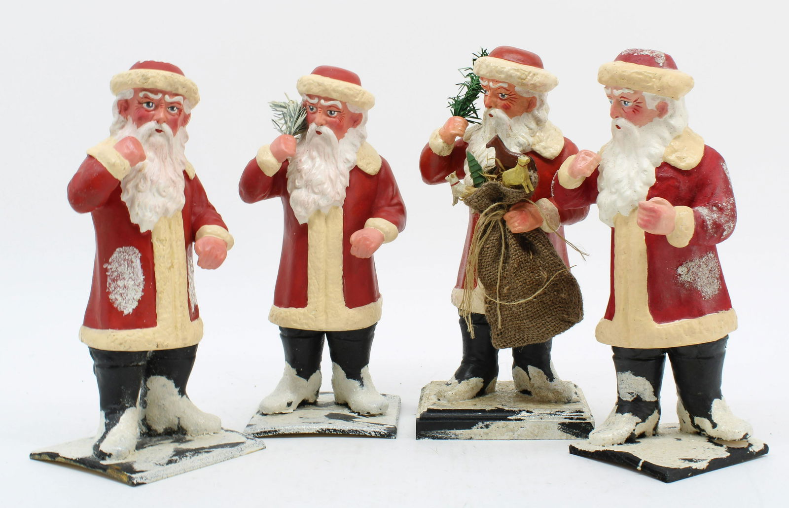 Four Candy Container Santa Figures (1 of 4)
