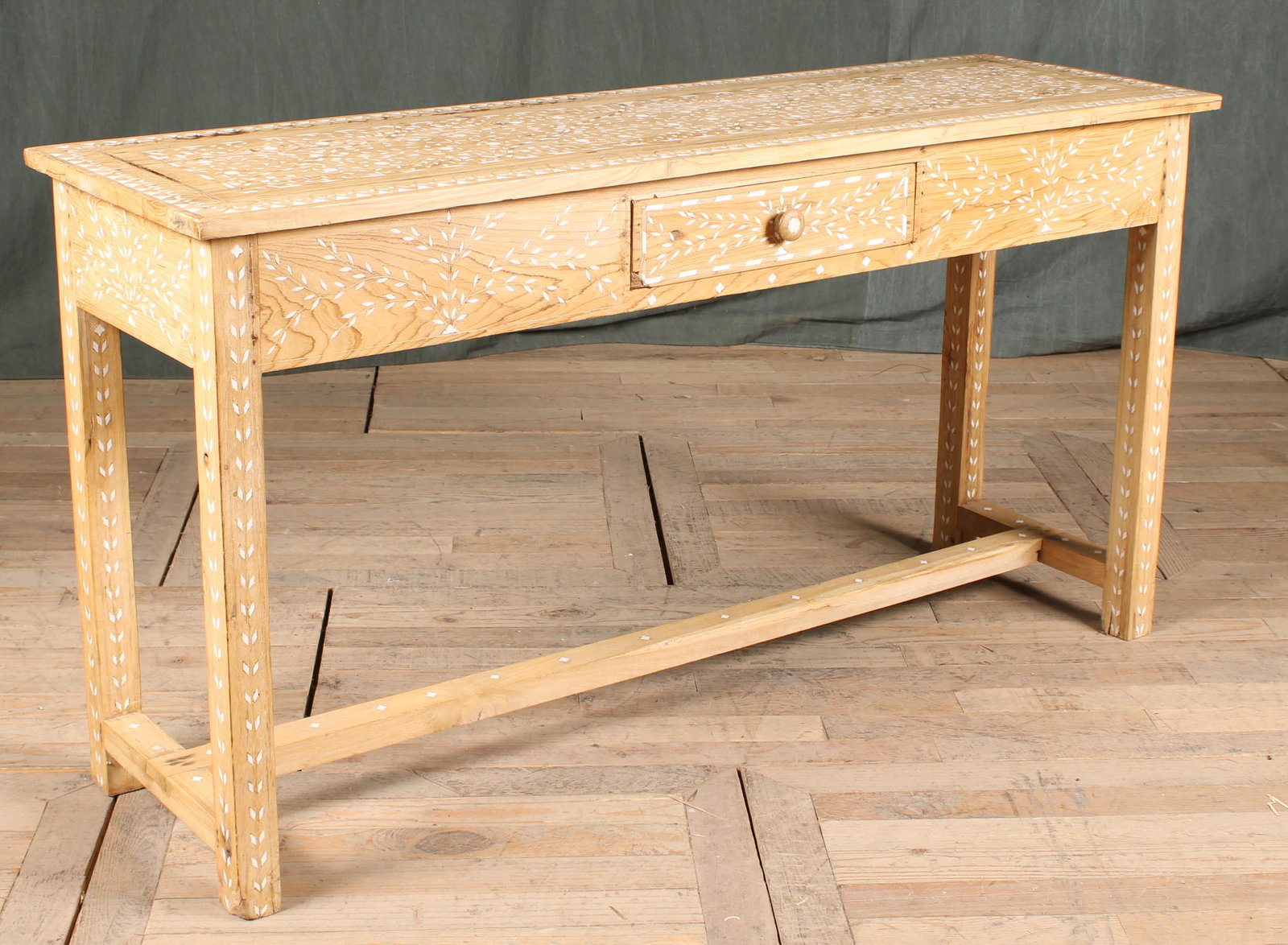 Anglo Indian Bone Inlaid Console Table: An interesting Anglo Indian bone inlaid console table with overall decoration and a single drawer. Size: 31"H x 59"W x 18"D