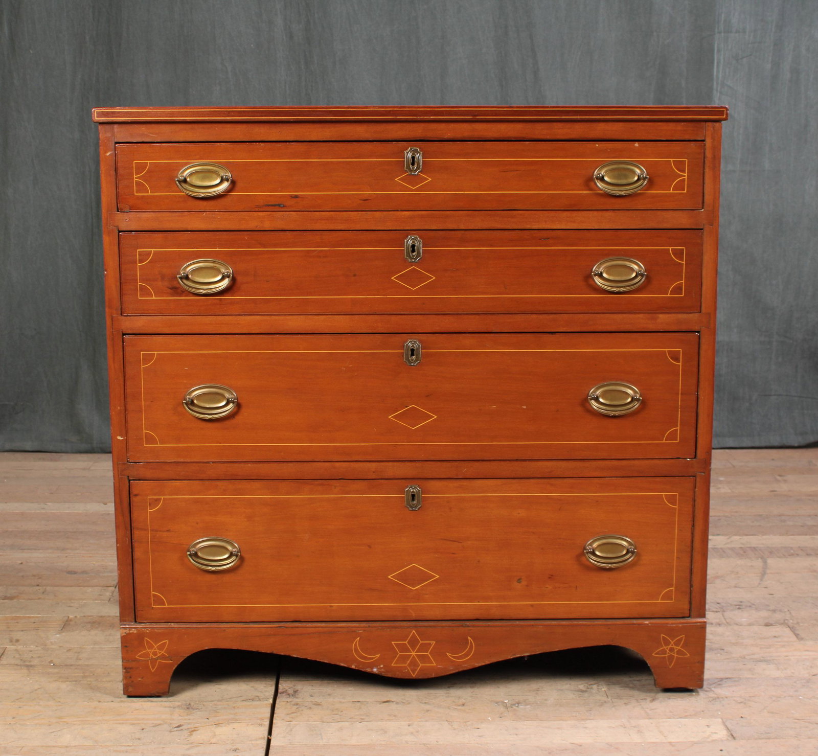 Monogrammed Inlaid Chest of Drawers: A good American late 18th to early 19th Century chest of drawers. Possibly mid Atlantic having line inlaid top, drawers, fronts and scalloped apron. Size: 35.5" H x 36" W x 18" D