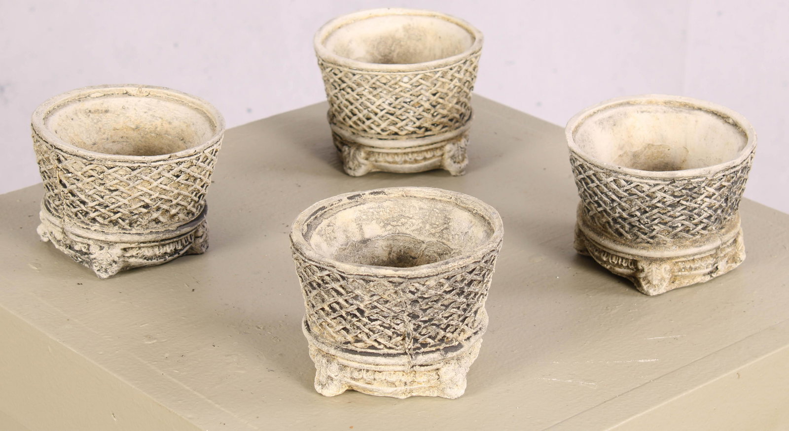 4 Cast Stone Basketry Motif Footed Planters: 4 Cast Stone Basketry Motif Footed Planters Measured: H 3" x W 3" x D 3"