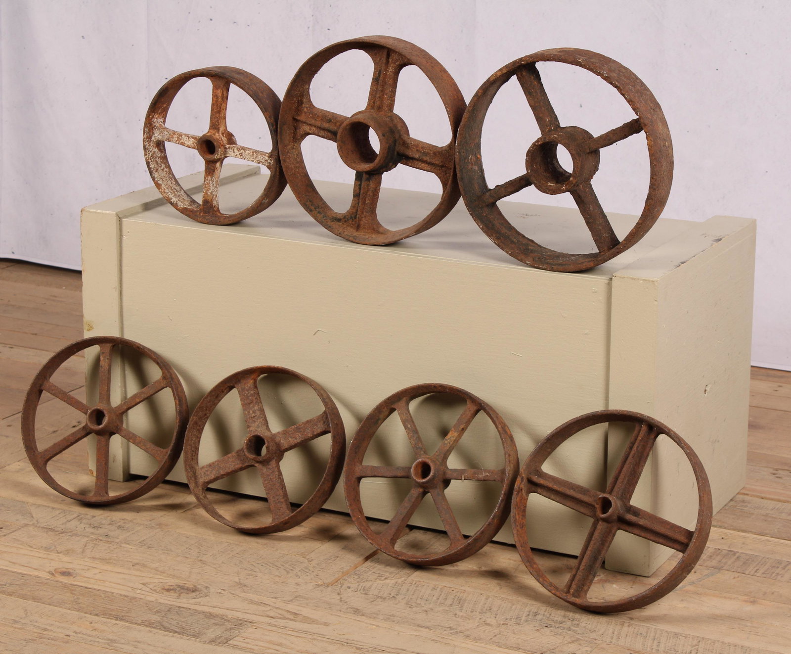 Group of 7 Industrial Cast Iron Wheels: Group of 7 Industrial Cast Iron Wheels. Size: Various