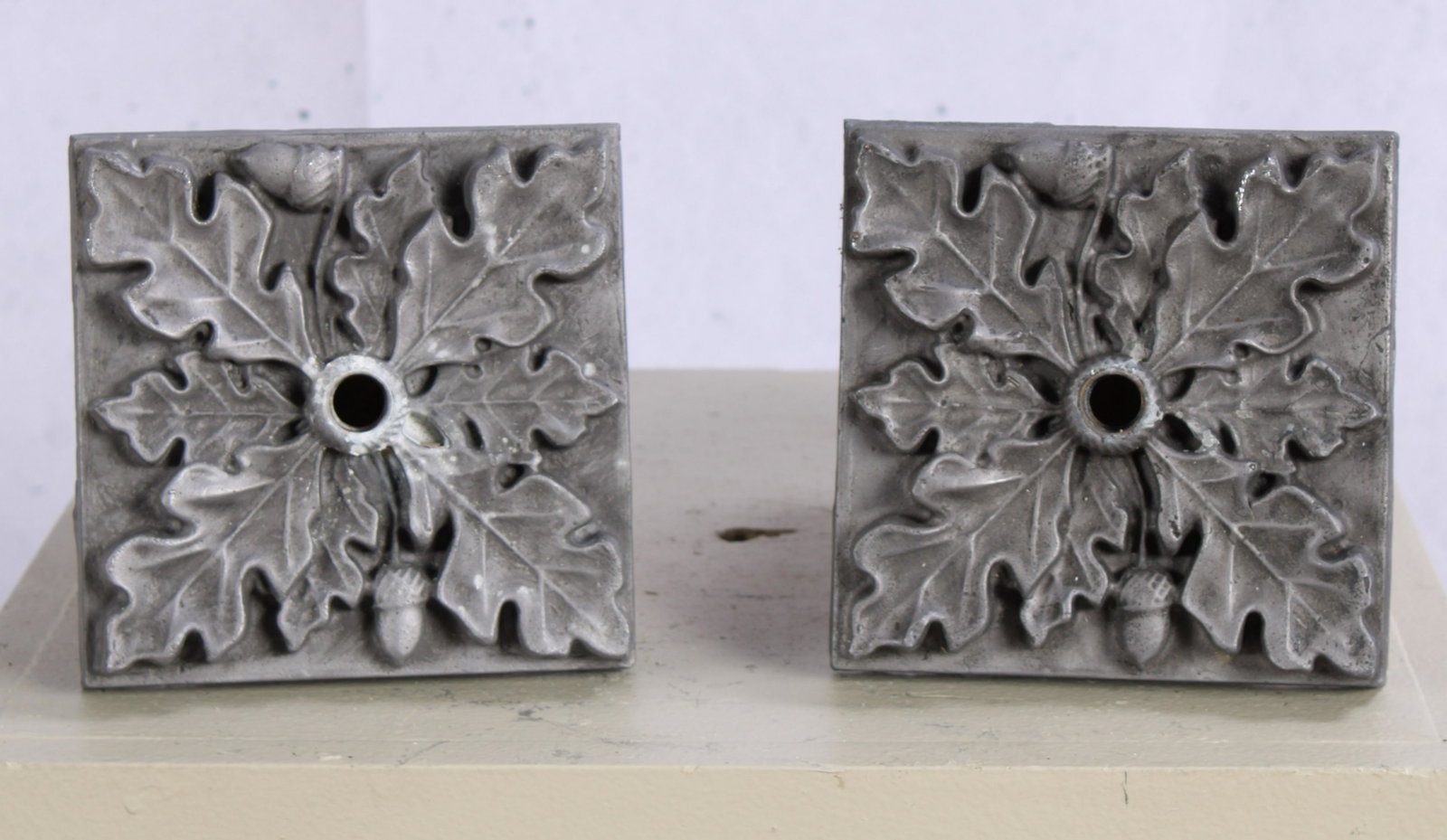 Pair Cast English Lead Acorn Motif Fountain Spouts: A pair of English cast lead acorn decorated water spouts. Size: 6"H x 6"W