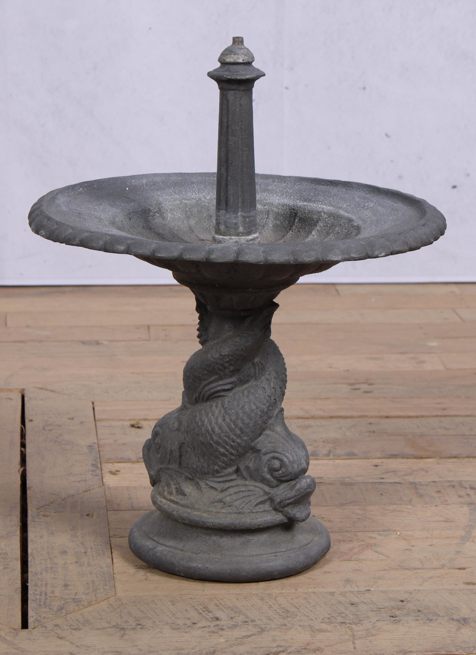 English Lead Garden Fountain, Mythical Dolphins: An English cast lead garden fountain with upper shallow bowl and fluted spout. Size: 19"H x 14.5" Dia.