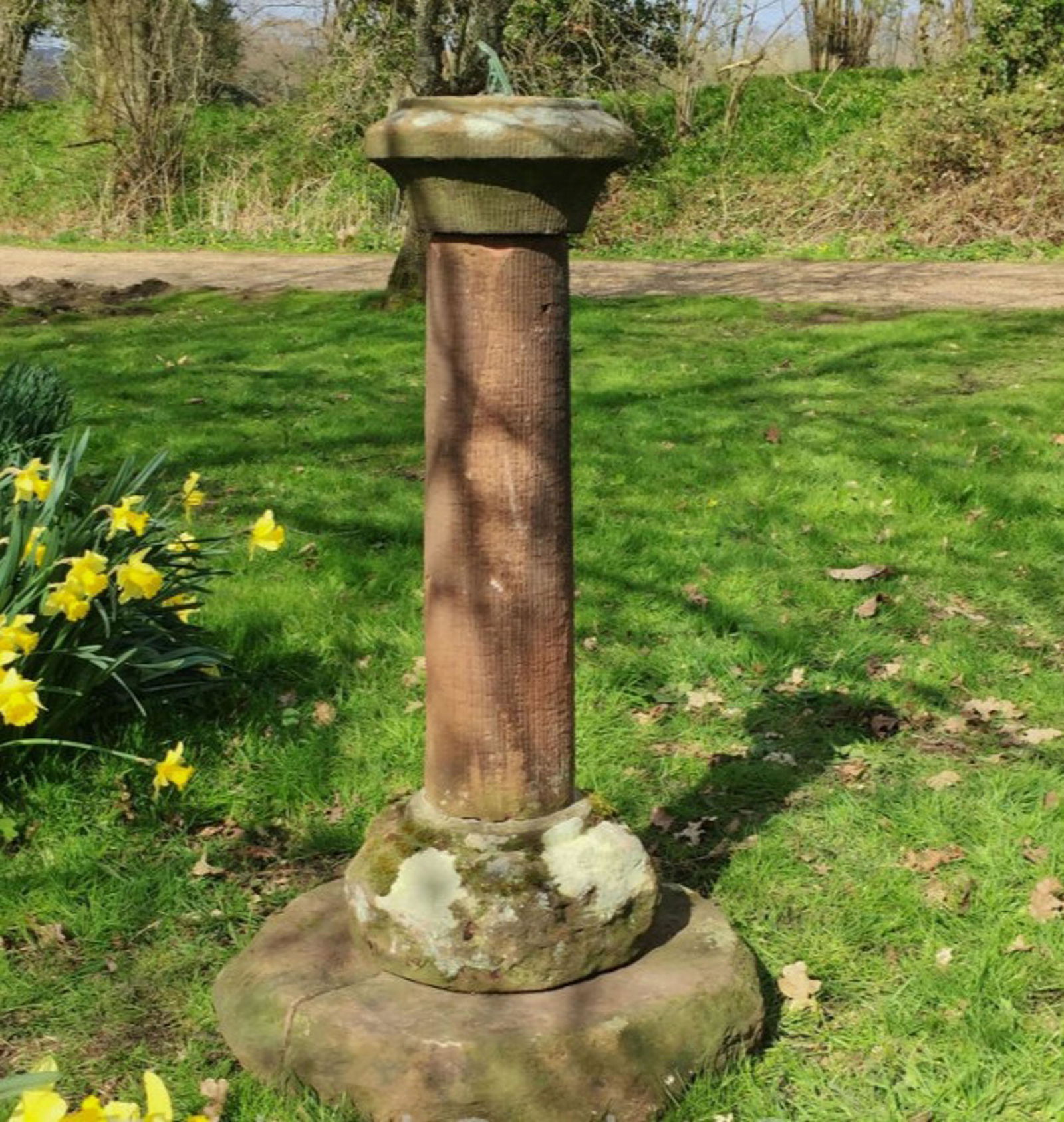 Antique English Carved Brownstone Sundial: Antique English Carved Brownstone Sundial. Size: 48" high on 24" diameter base.