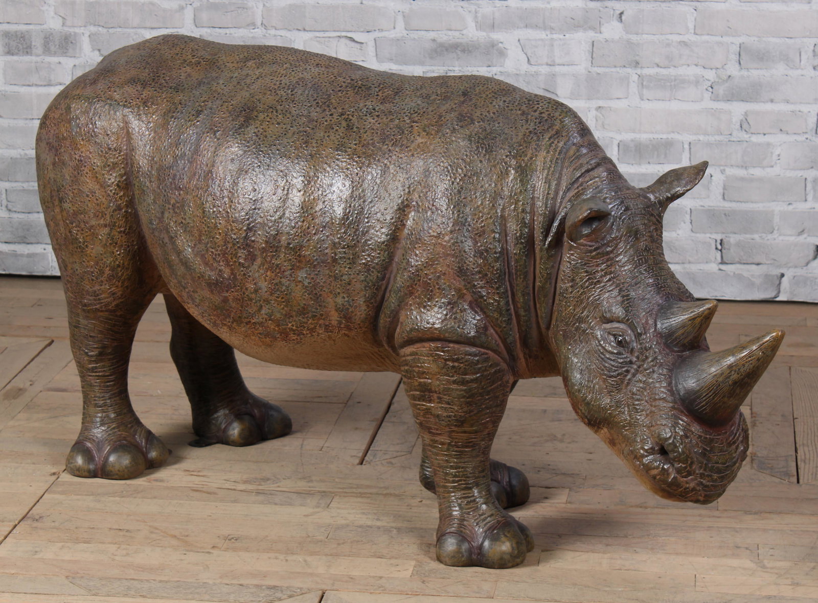 Garden Rhinoceros: A whimsical and realistic composite Rhinoceros. Measured: L 30" x W 20" x D 57"