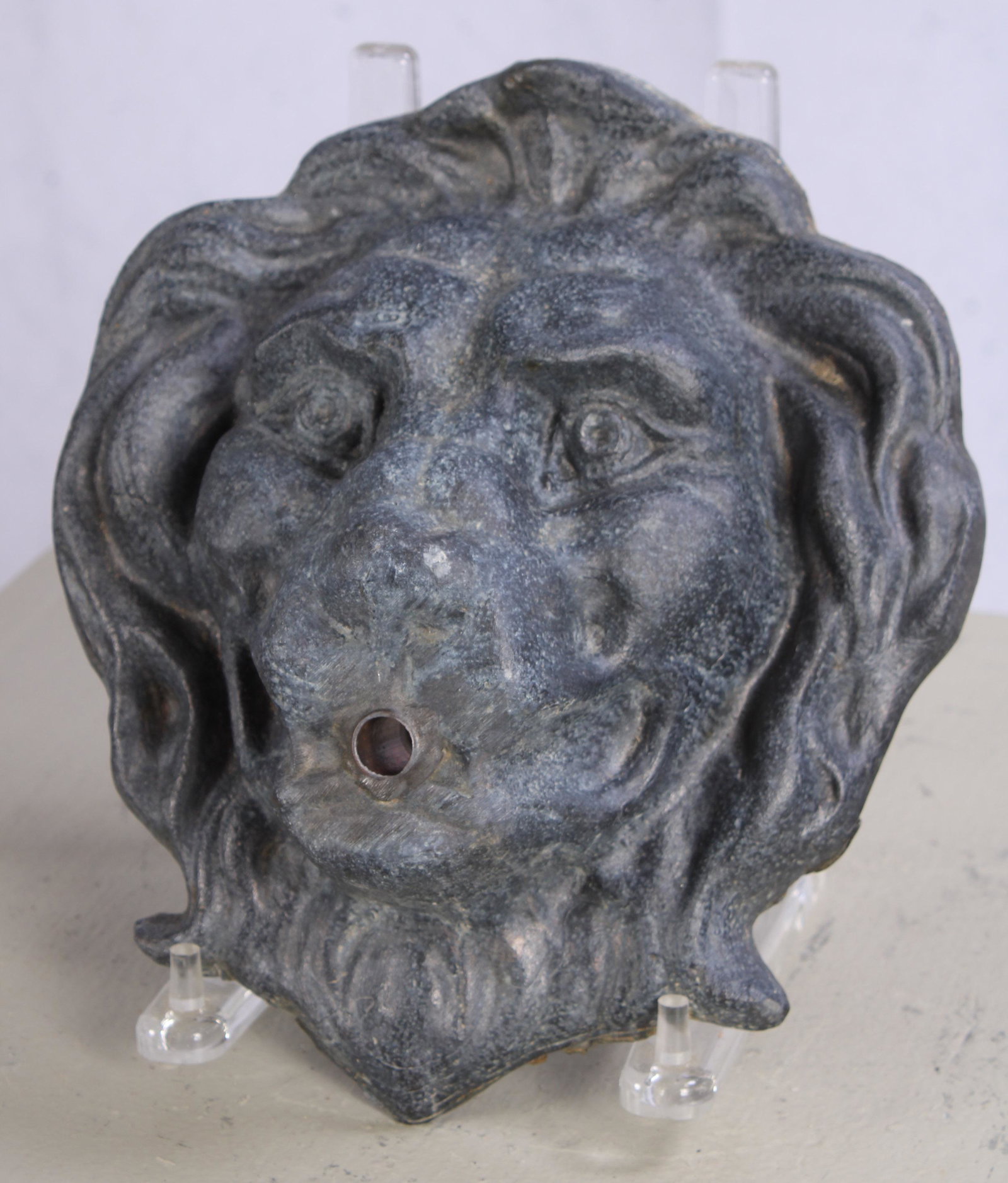Lion Head Spout, English Lead: An English cast lead lion face garden wall fountain. Measured: H 9.5" x W 8" x D 4"