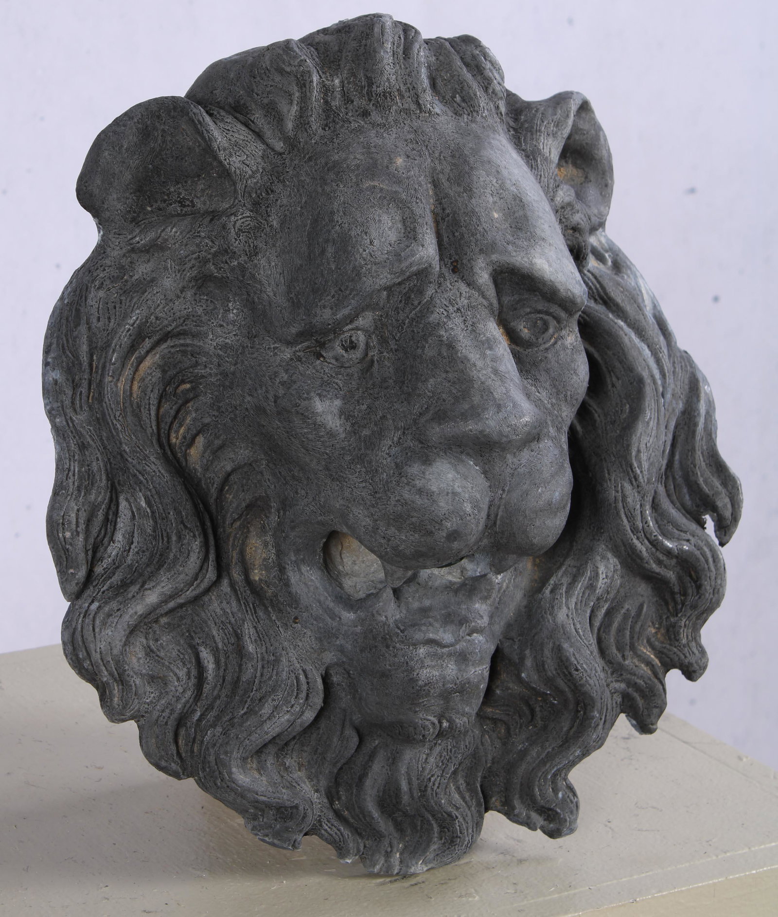 Cast Lead Lion Face Fountain Spout, English: Cast Lead Lion Face Fountain Spout, English. Measured: H 15" x W 13.5" x D 6.5"