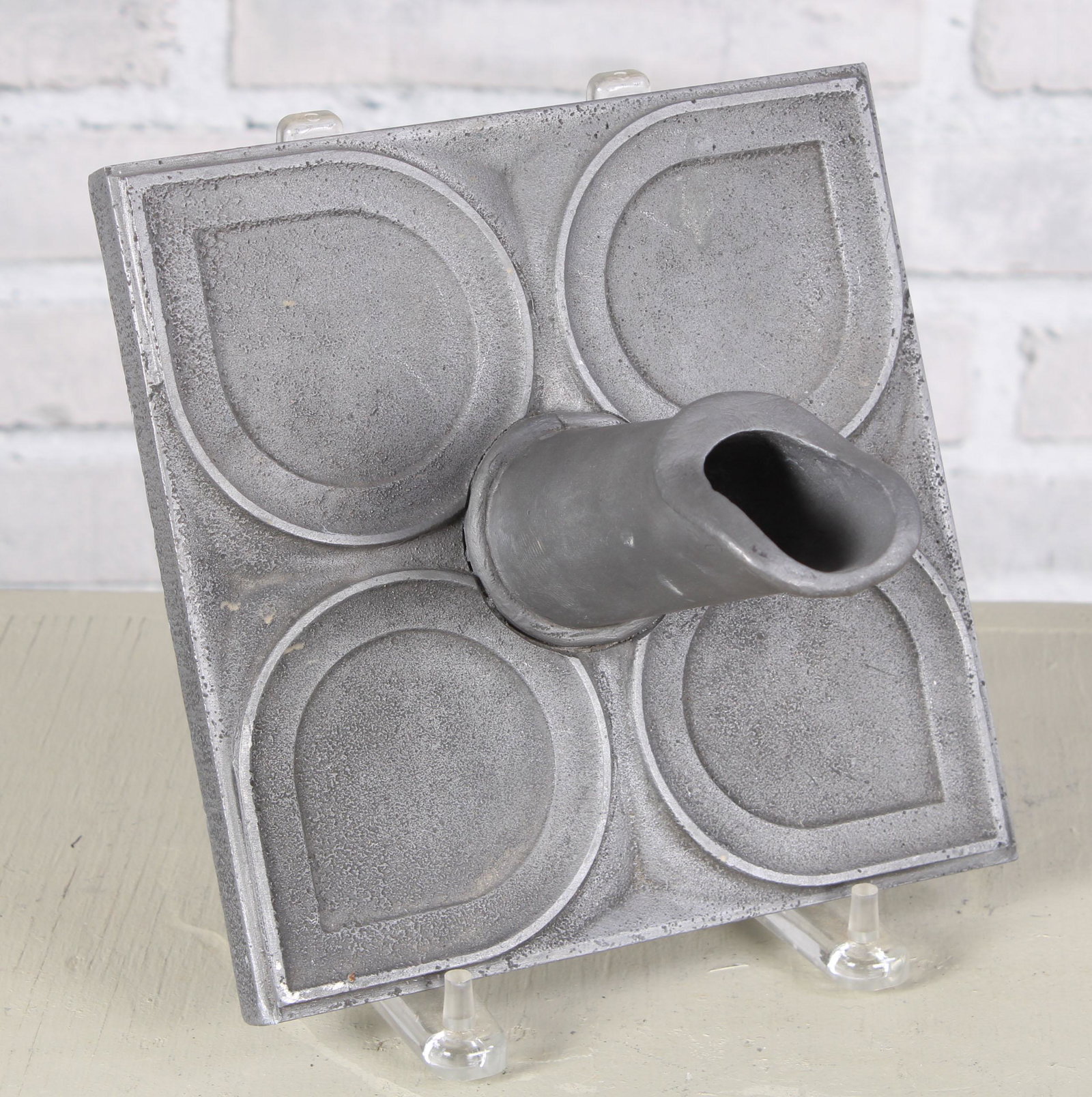 English Lead Garden Fountain Spout: English lead garden fountain spout with stylized leaf decoration. Size: 8"H x 8"W x 6.5"D