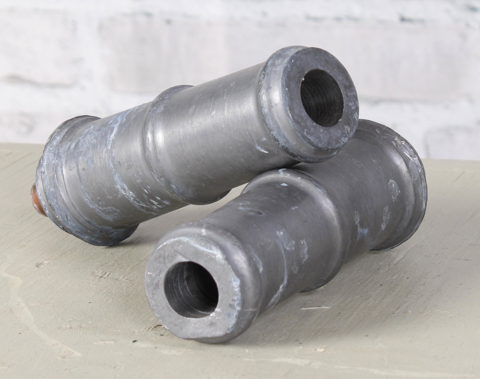 Pair of Lead garden Fountain Spouts: A pair of English lead garden/ fountain spouts. Measured: L 6" x Dia. 2.25"