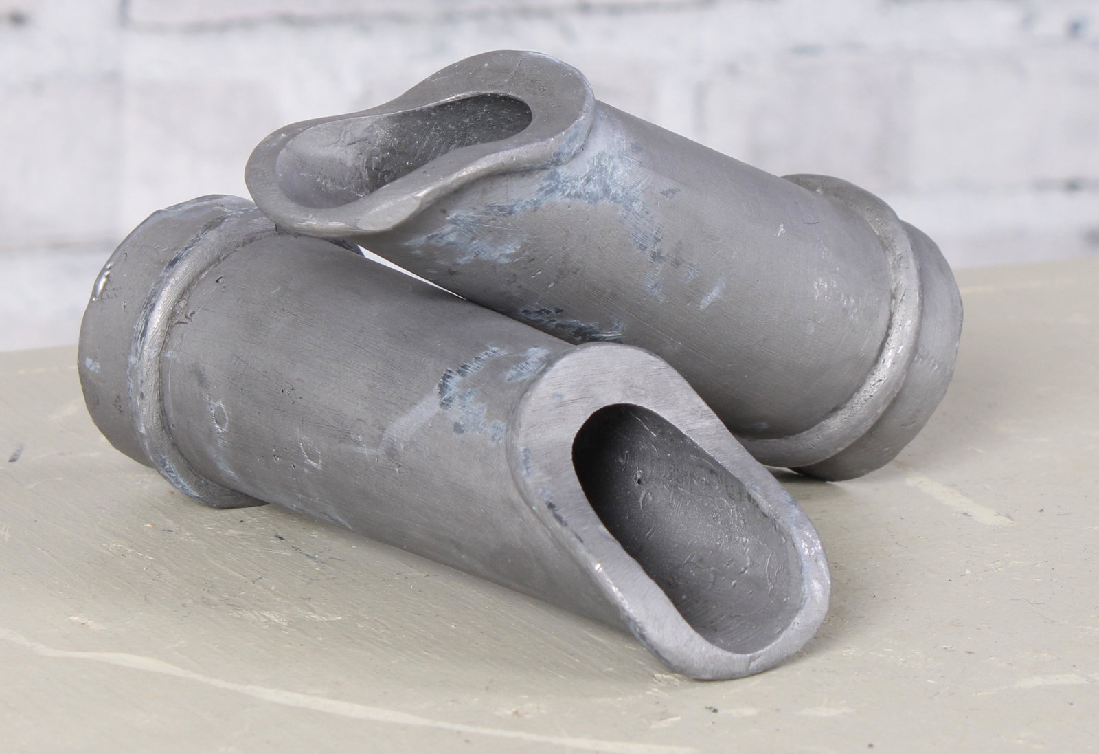 Pair of English Lead Spouts or Scuppers: A pair of English lead garden water spouts. Measured: L 6" x Dia. 2.25"