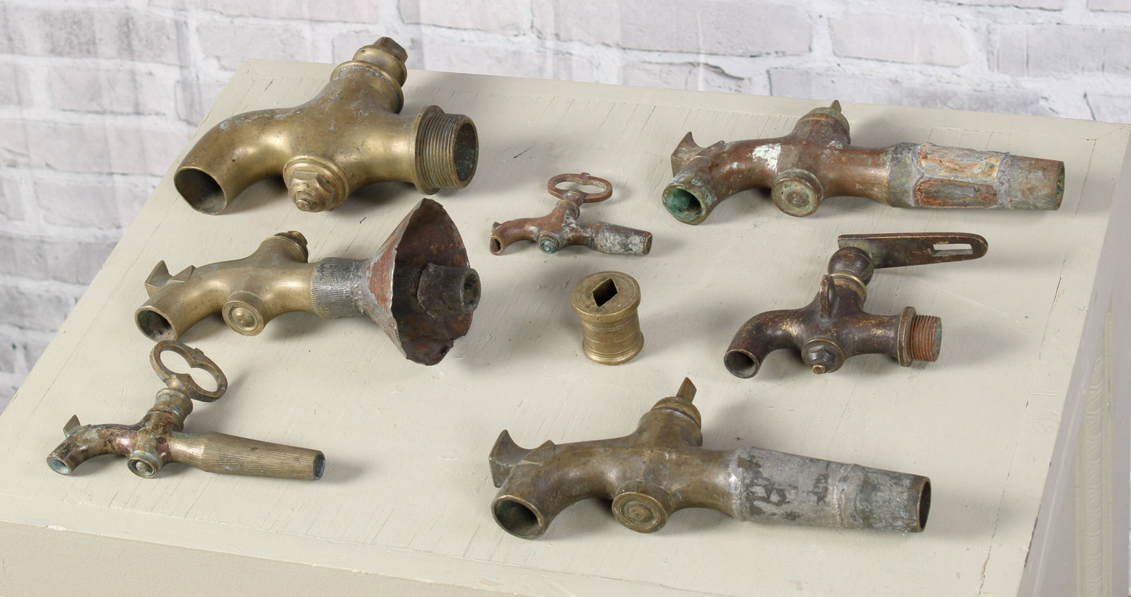 Collection Of Antique Bronze Spigots: A collection of vintage bronze water spouts or fountain spigots. Nice group. Biggest Measured: H 6" x W 7.5" x D 2.5"