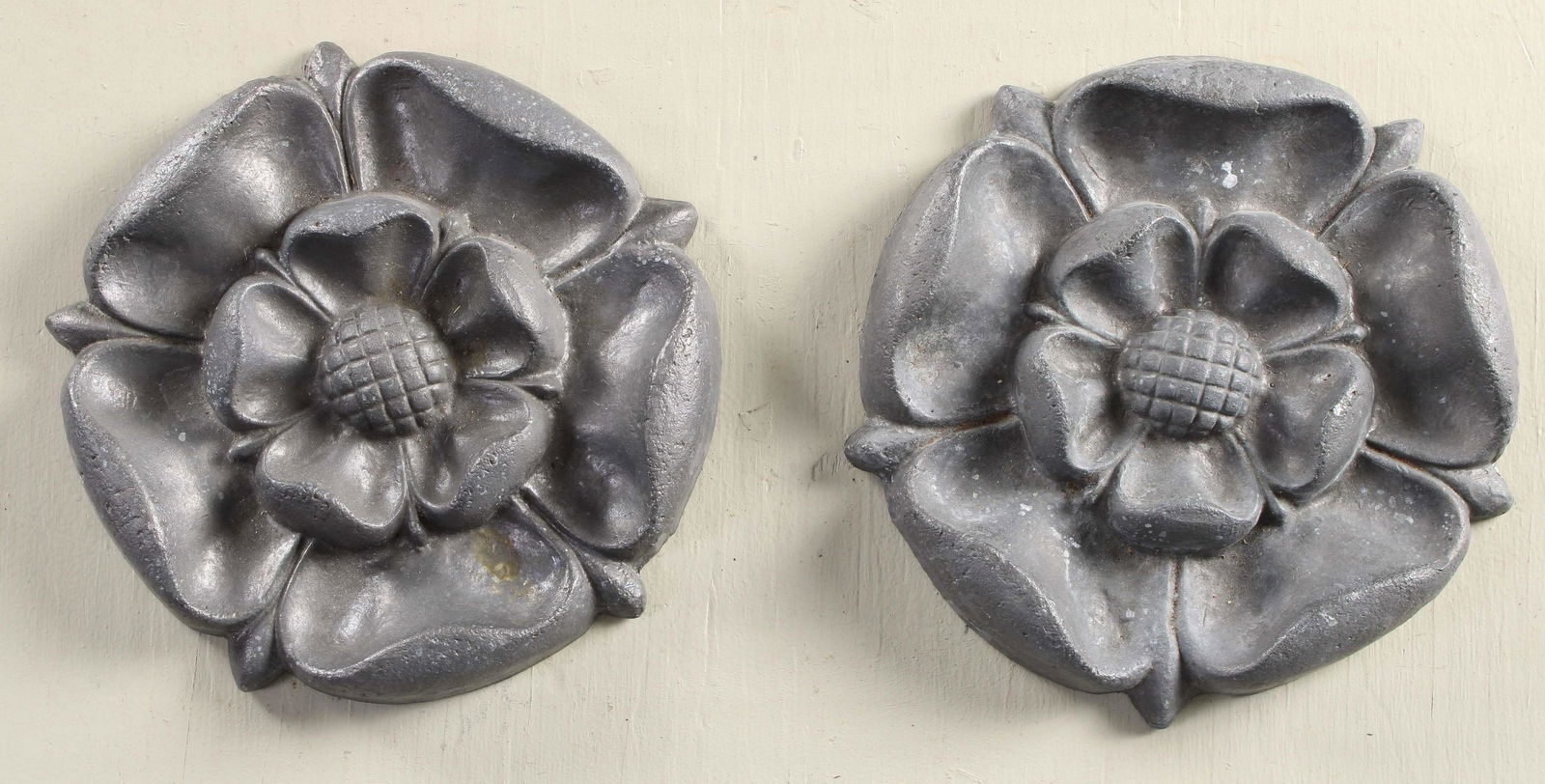 Pair English Cast Lead Tudor Rose Ornaments: A pair of English lead Tudor Rose design medallion. Measured: Dia. 8.5" x 1.5"