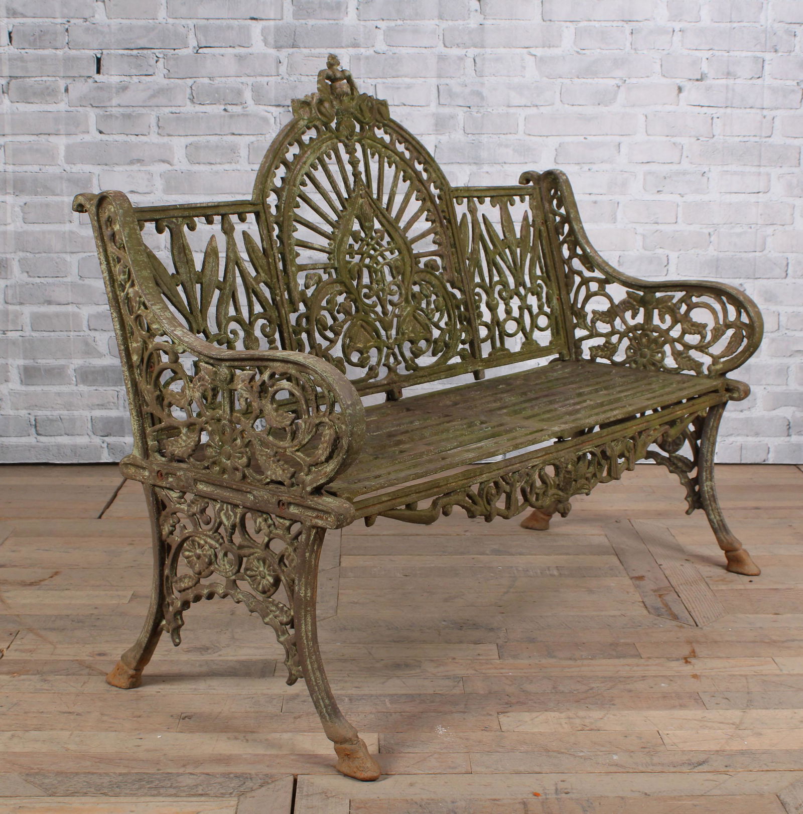 Victorian Style Laurel Frond Cast Iron Bench: Victorian Style Laurel Frond Cast Iron Garden Bench. Size: 41.5" H x 50" W x 24" D