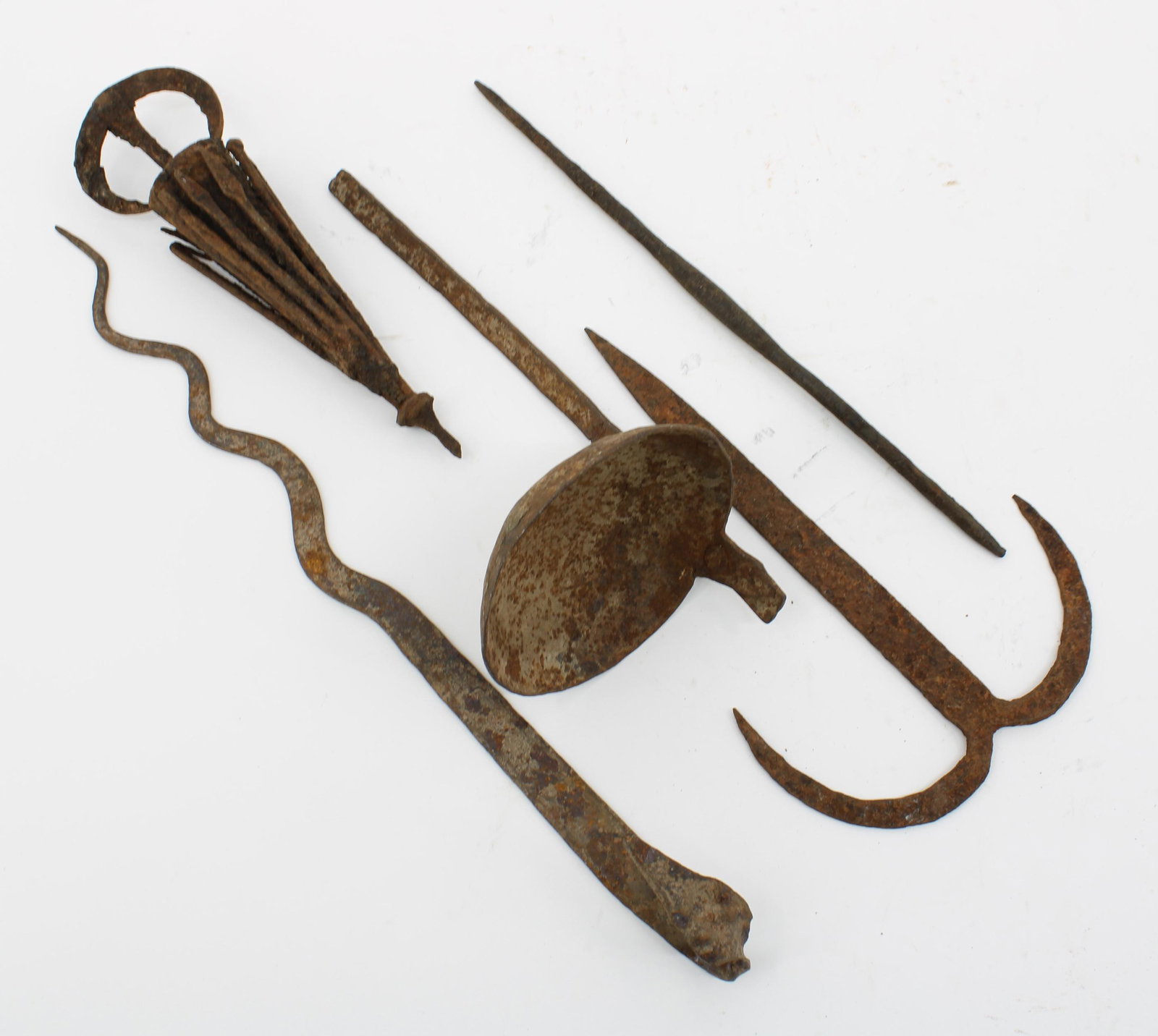 Collector Group of African Wrought Iron Artifacts: Collector Group of African Wrought Iron Artifacts. Including Dogon, Fon, and Kuba examples. Size: 18"T, 12"T, 10"T, 10.5"T, 13.5"T