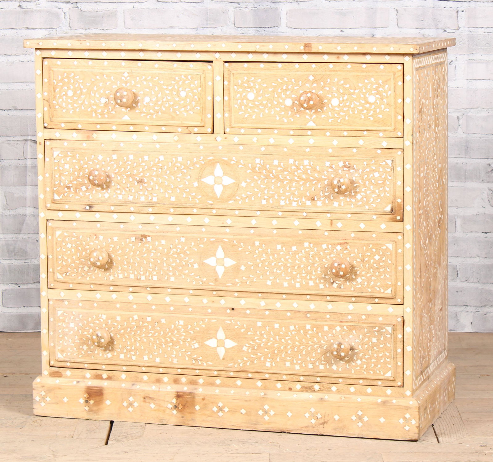 Bone Inlay Chest of Drawers: A bone inlaid chest of drawers having two over three drawers and elaborate overall design. Size: 36"H x 37.75"W x 18"D