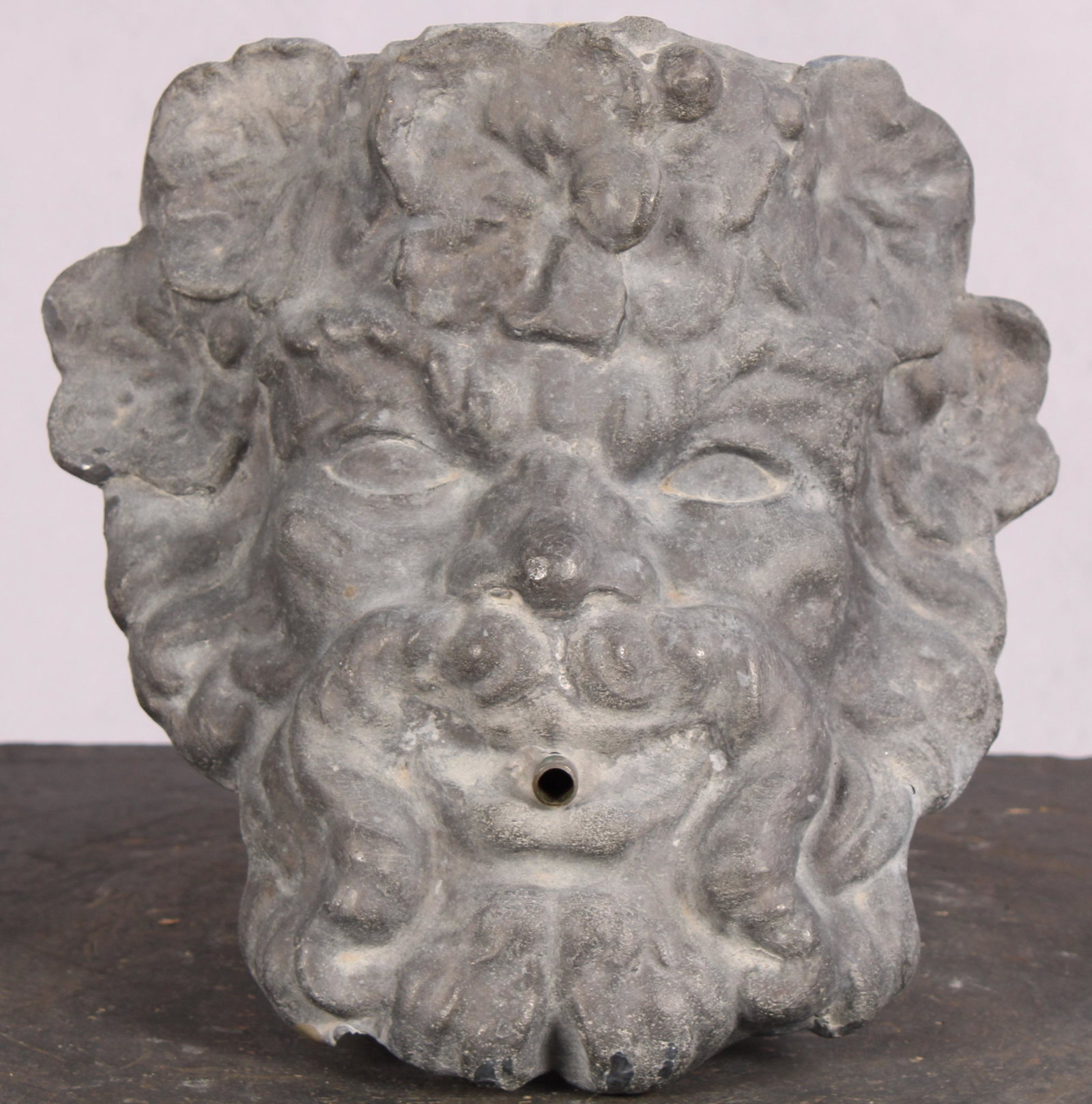 English Cast Lead Dionysus Fountain Spout: An English cast lead Dionysus fountain spout. Size: 9.5"H x 9.5"W