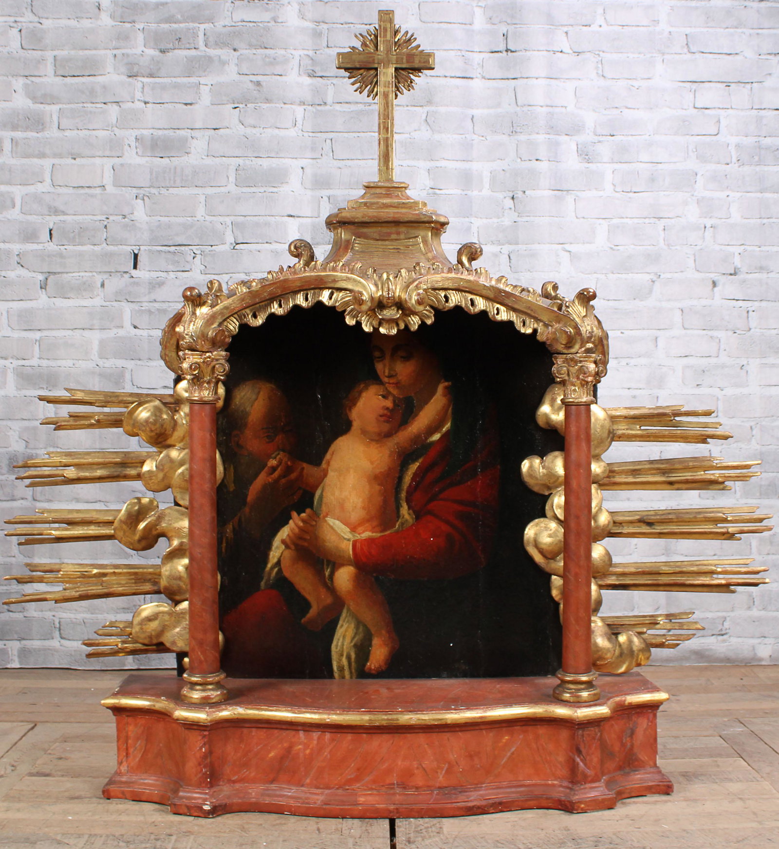 Madonna Altar: A very good Antique Continental gilt wood carved alter with central image. Size: 56"H x 57"W x 12"D