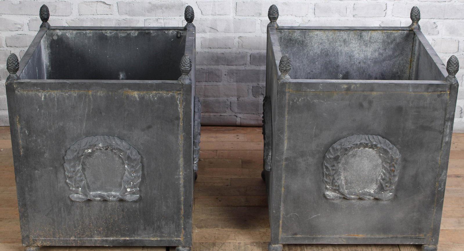 Pair of Cast Iron Garden Urns: Pair of Cast Iron Garden Urns. Size: 28"H x 23"W x 23"D