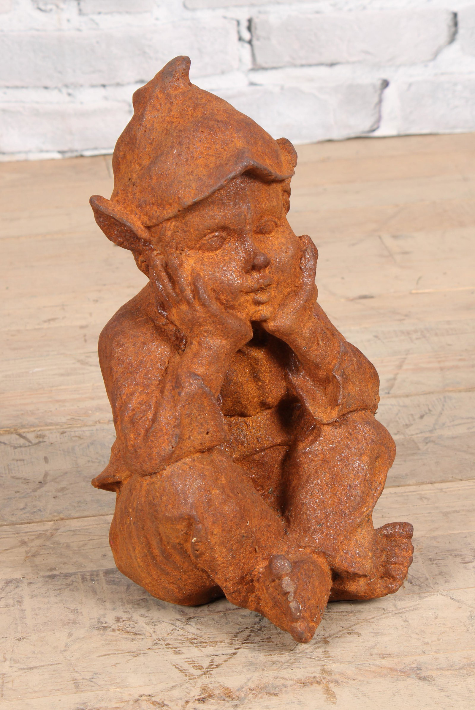 Cast Iron Elfin Boy Wall Sitter: Cast Iron Elfin Boy. Measured: H 17" x W 7" x D 8"