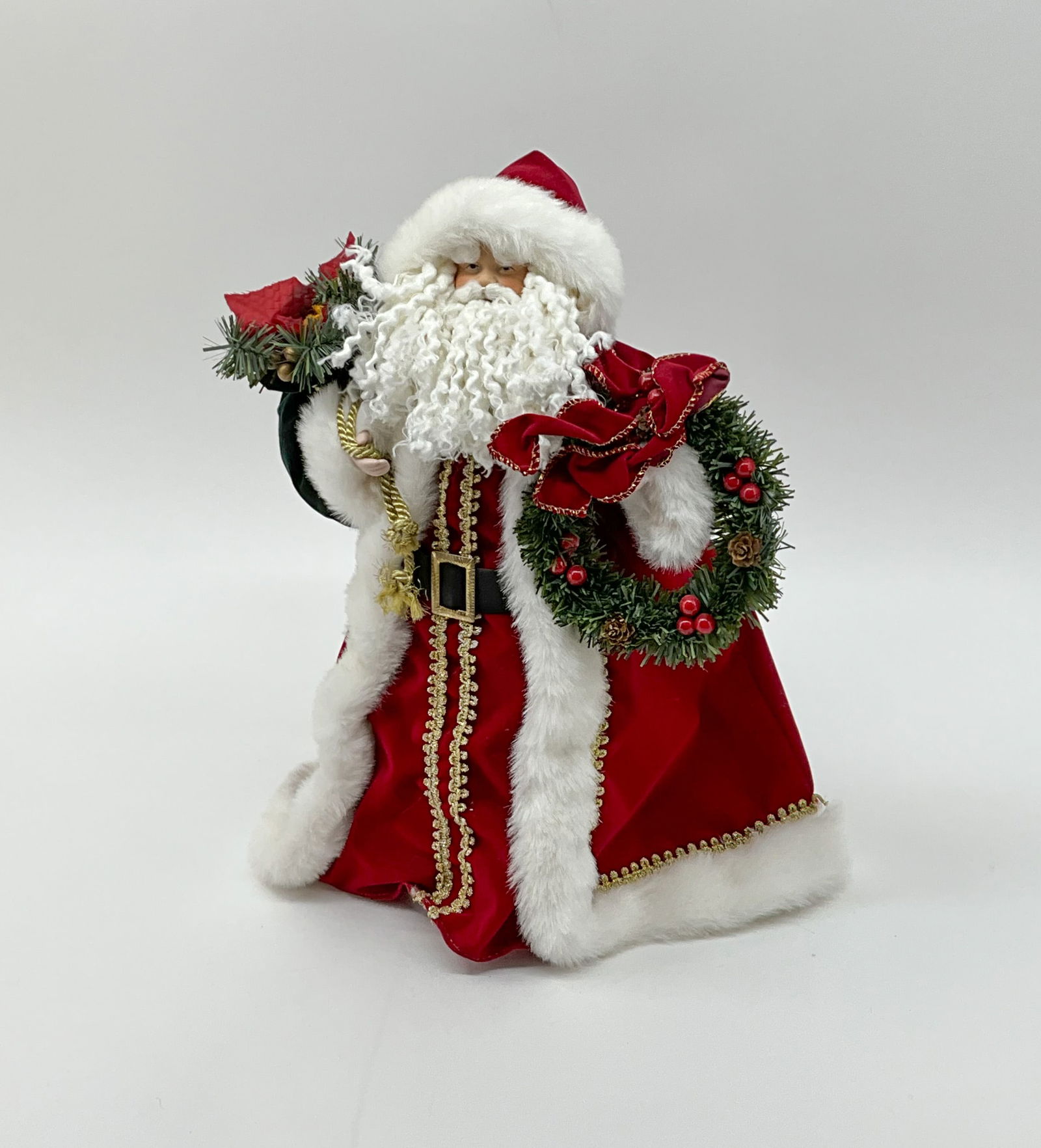 Curly Beard Santa in Red: Traditional Santa figure with the curliest beard, long velvet robe and ready to deck the halls. From a single owner collection, PA estate, stored in a glass cabinet.Size: H 12.5" x W 16.5" x D 10" Shi
