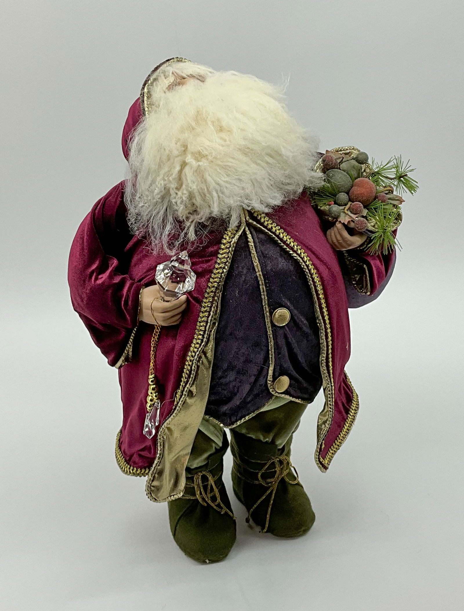 Stately Merlot Velvet Santa: Santa is looking real snazzy in his merlot velvet coat with crystal details. Plus an award winning Santa belly. From a single owner collection, PA estate, stored in a glass cabinet. Size: H 22" x W 15