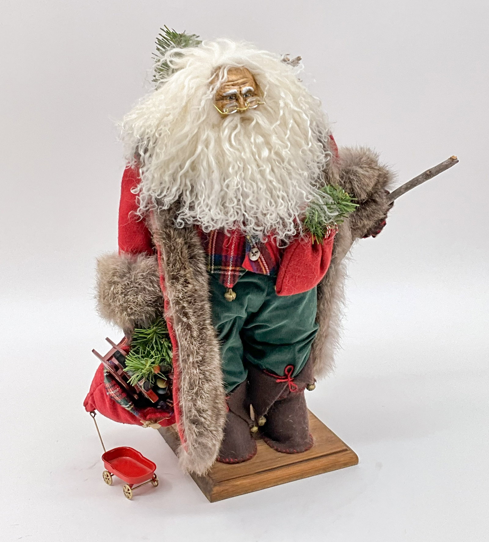 Santa Taking a Hike With Your Gifts: Santa's got a great walking stick and he's on a mission to deliver all the toys. Jenna Hall Collection, 498/1500. From a single owner collection, PA estate, stored in a glass cabinet. Size: H 18.5" x 
