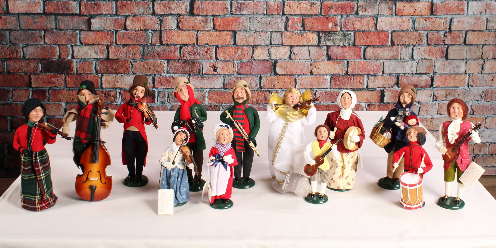Caroler's with Instruments, Buyer's Choice: We're getting the band back together! Carolers with a variety of instruments from Byer's Choice. See photos for release dates. From a single owner collection, PA estate, stored in a box. Size: approxi