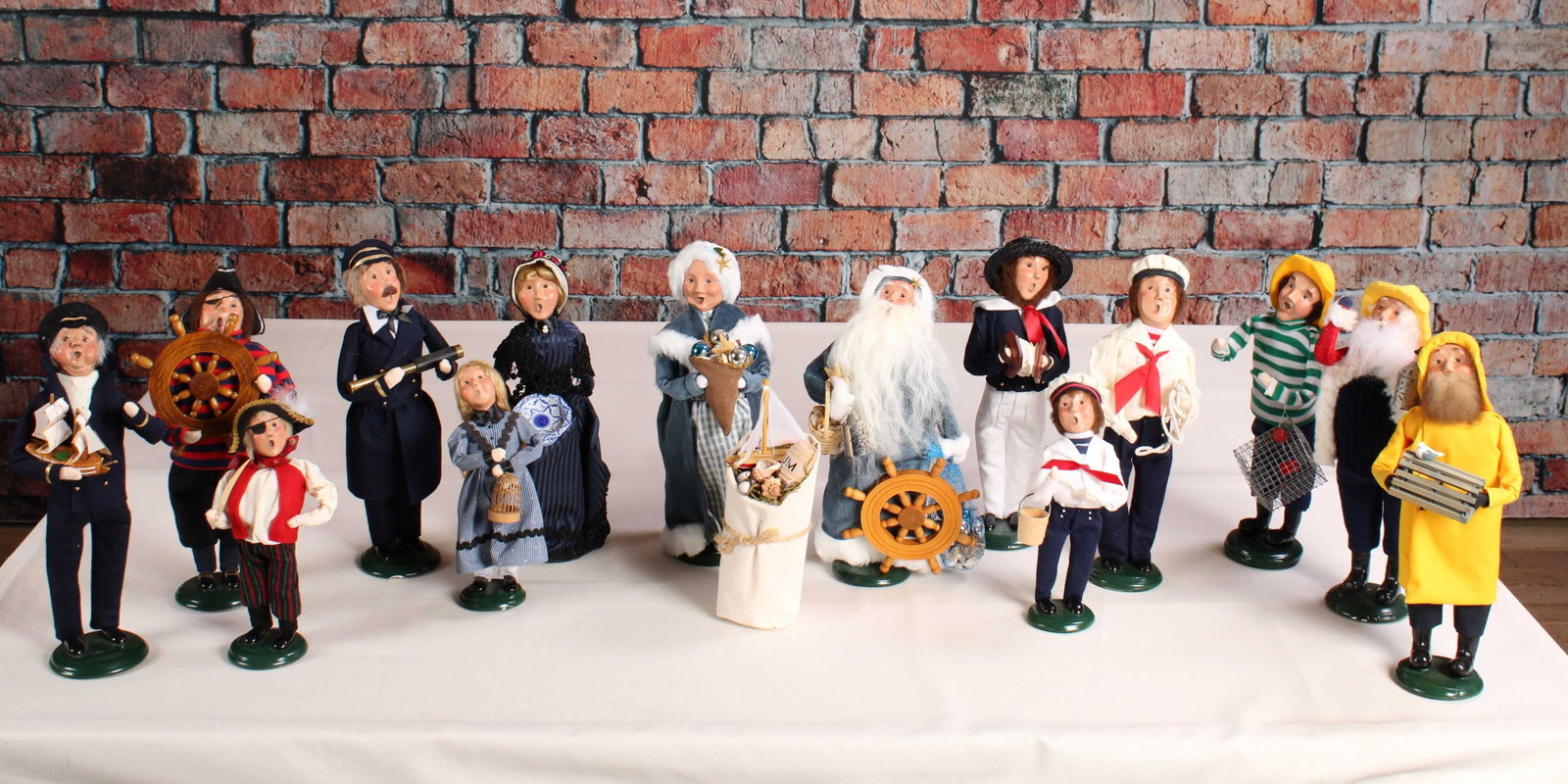 Nautical Holiday Carolers, Byer's Choice: Seaside holidays with these nautical Carolers. Frankly Mr & Mrs Claus are killing it in blue. See photos for dates. From a single owner collection, PA estate, stored in a box. Size: approximately 14"T
