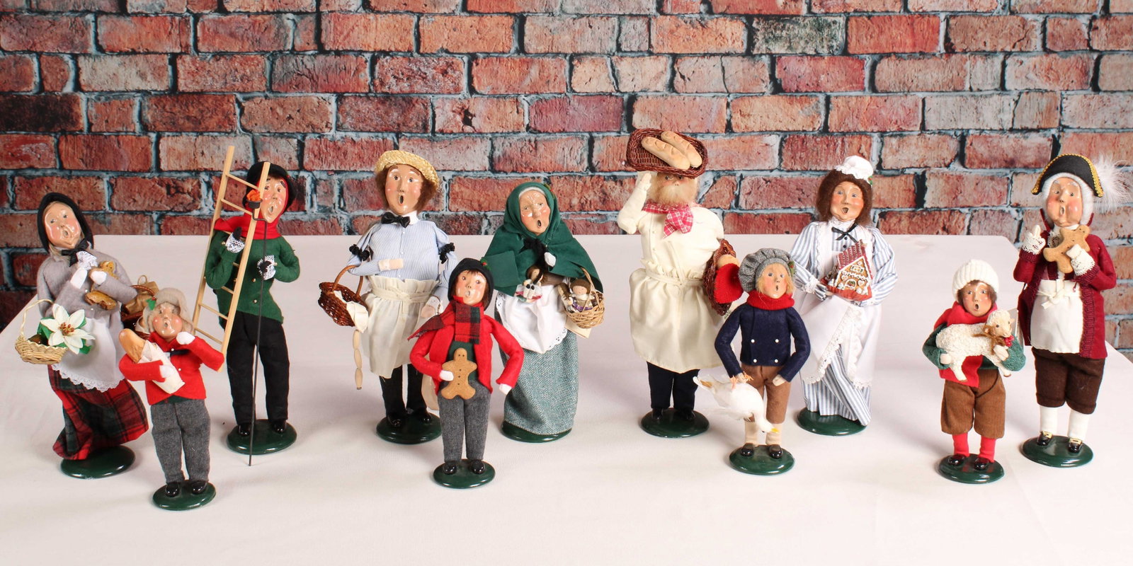 Crier's of London From Byer's Choice: Another great selection for the Crier's of London collection from Byer's Choice. These carolers all look ready for the holiday feast! See photos for dates. From a single owner collection, PA estate, s