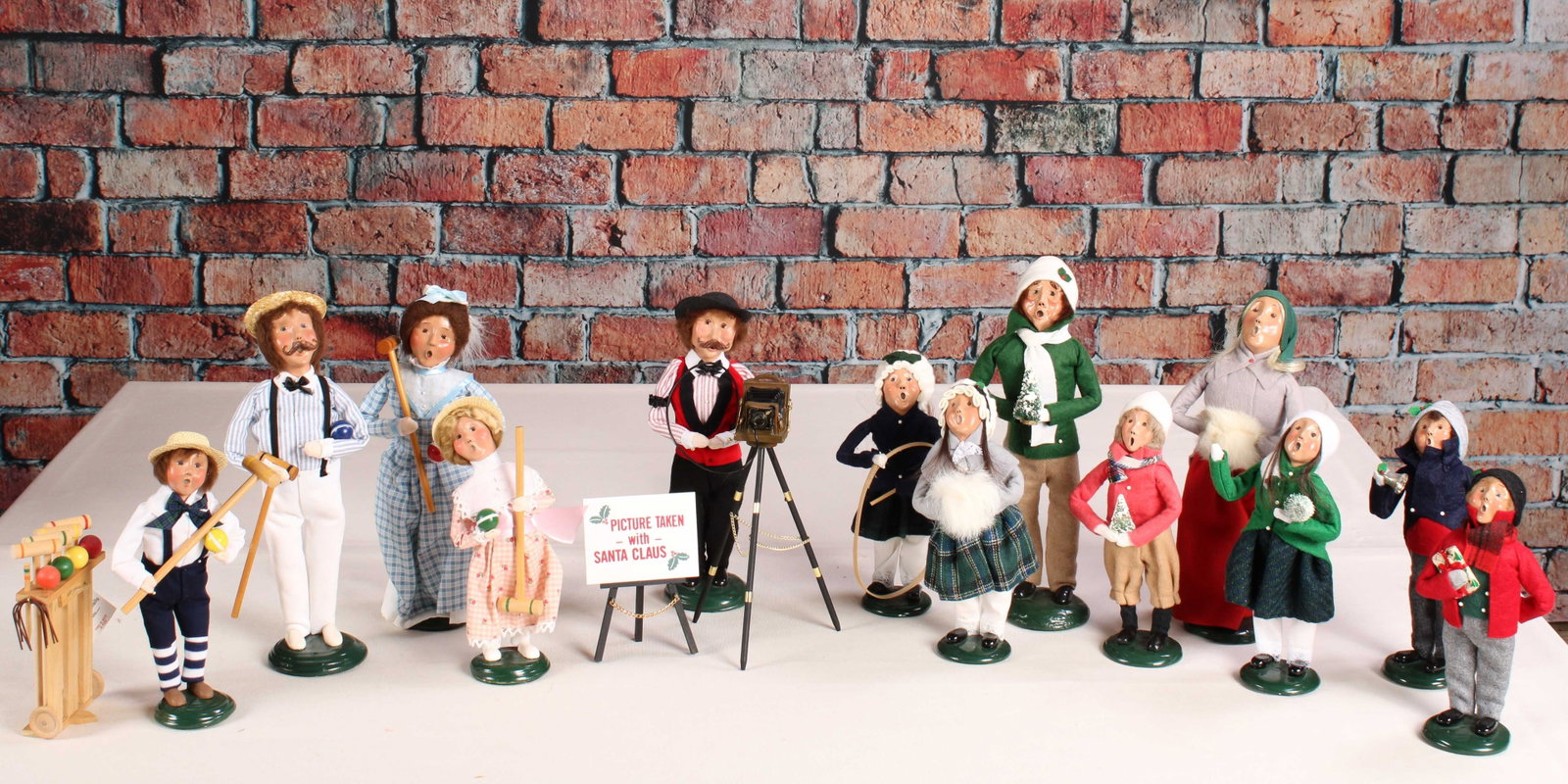 Caroler Selection, Byer's Choice: Caroler selection including the croquet family, photographer, and a group of kiddos. See photos for dates. From a single owner collection, PA estate, box stored. Earliest from 1985. Size: approximatel