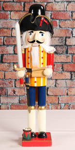 Large Display Nutcracker with Drum: Traditional floor standing nut cracker with drum and sword. From a single owner collection, PA estate, stored in a box. Size: 30"T x 10"W x 8"D Shipping Note: For your convenience, we have arranged wi